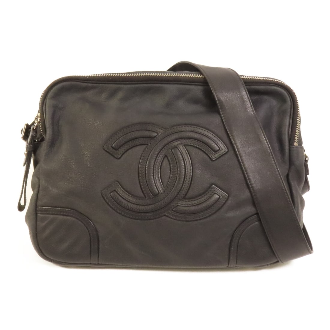 Chanel Black Calfskin Leather Shoulder Bag with CC and Silver Hardware: Chanel Black Calfskin Leather Shoulder Bag with CC and Silver Hardware This Chanel CC shoulder bag is crafted from black calfskin leather and designed for women. It features a classic silhouette with 