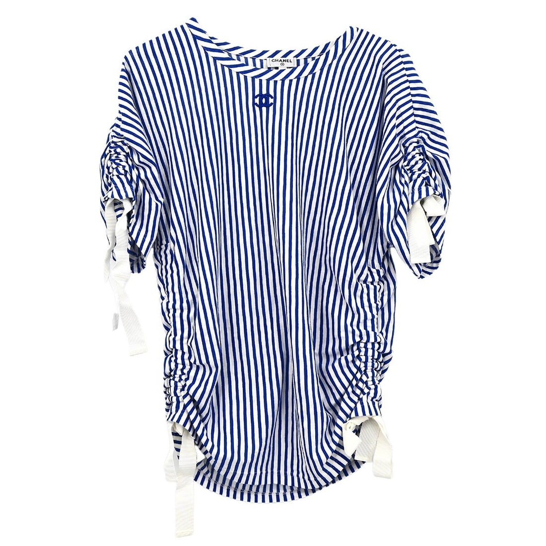 Vintage Chanel Blue Short Sleeve Top with Bow Accent #36: Vintage Chanel Blue Short Sleeve Top with Bow Accent #36 Elevate your casual wardrobe with this vintage Chanel short sleeve top, designed in a refreshing blue hue. Crafted from a comfortable blend of 
