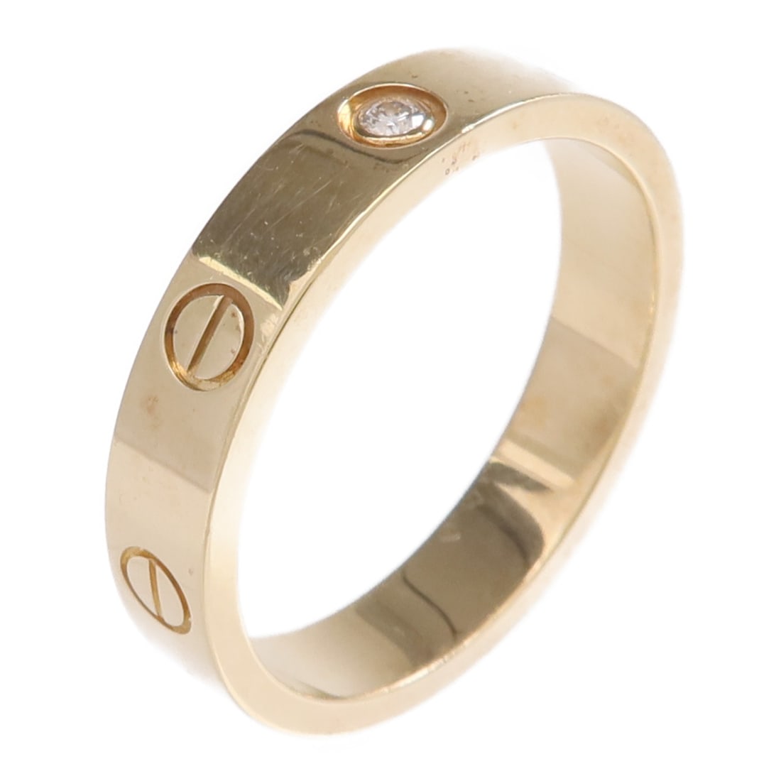 Cartier Love Mini 18K Yellow Gold Diamond Ring Size 7.5: Cartier Love Mini 18K Yellow Gold Diamond Ring Size 7.5 This Cartier Mini Love Ring is crafted from 18K yellow gold and features a single diamond accent. Designed for women, the ring is a size 7.5 (US