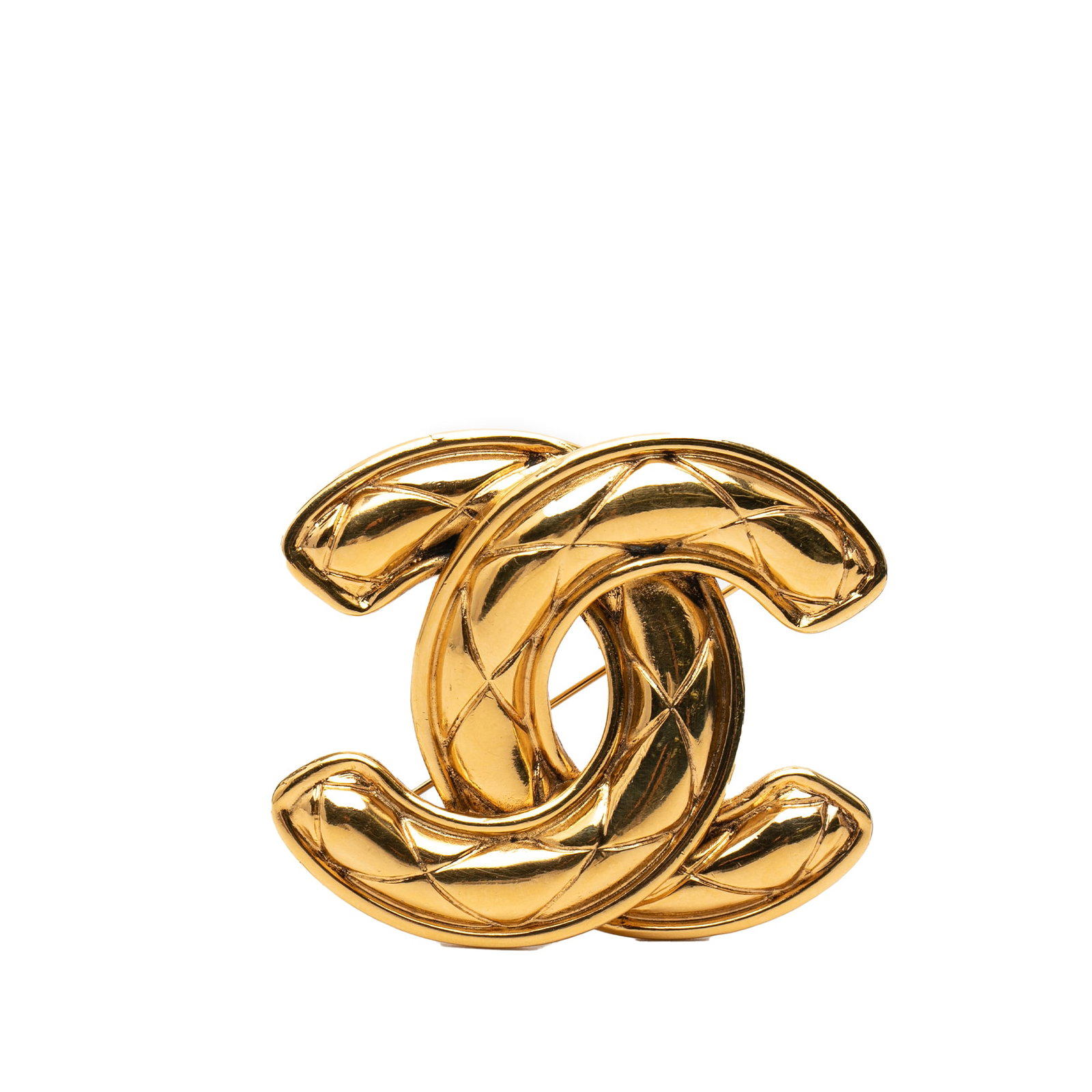 Chanel Quilted CC Brooch Gold Tone Metal Pin: Chanel Quilted CC Brooch Gold Tone Metal Pin This Chanel brooch features a gold-tone metal body with a signature CC quilted design and a back pin closure. The piece is categorized as costume jewelry a
