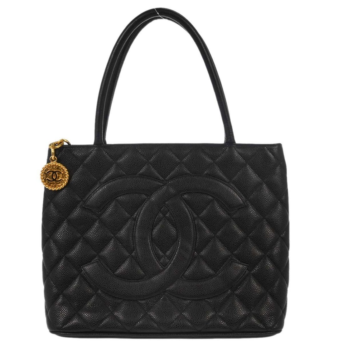 CHANEL Medallion Black Caviar Skin Leather Tote Bag: CHANEL Medallion Black Caviar Skin Leather Tote Bag This Chanel Black Calfskin Medallion Tote Handbag features a classic matelasse quilted pattern and is crafted from durable caviar skin leather. It h