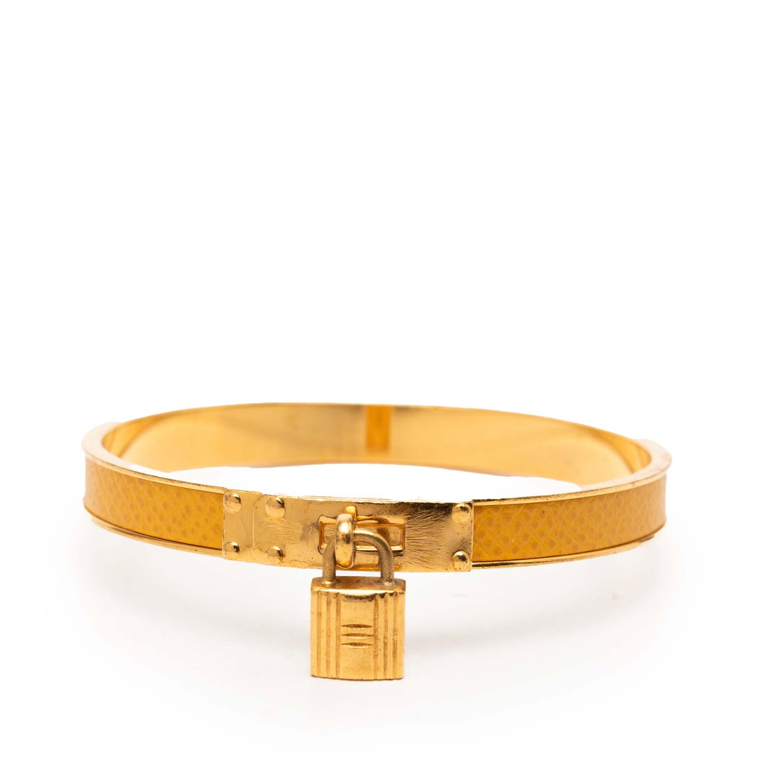 Hermes Kelly Cadena Lock Epsom Leather Gold Plated Bangle Bracelet: Hermes Kelly Cadena Lock Epsom Leather Gold Plated Bangle Bracelet This Hermes Kelly Cadena Lock bangle bracelet features a gold-plated metal design paired with Epsom leather. The bracelet is crafted 