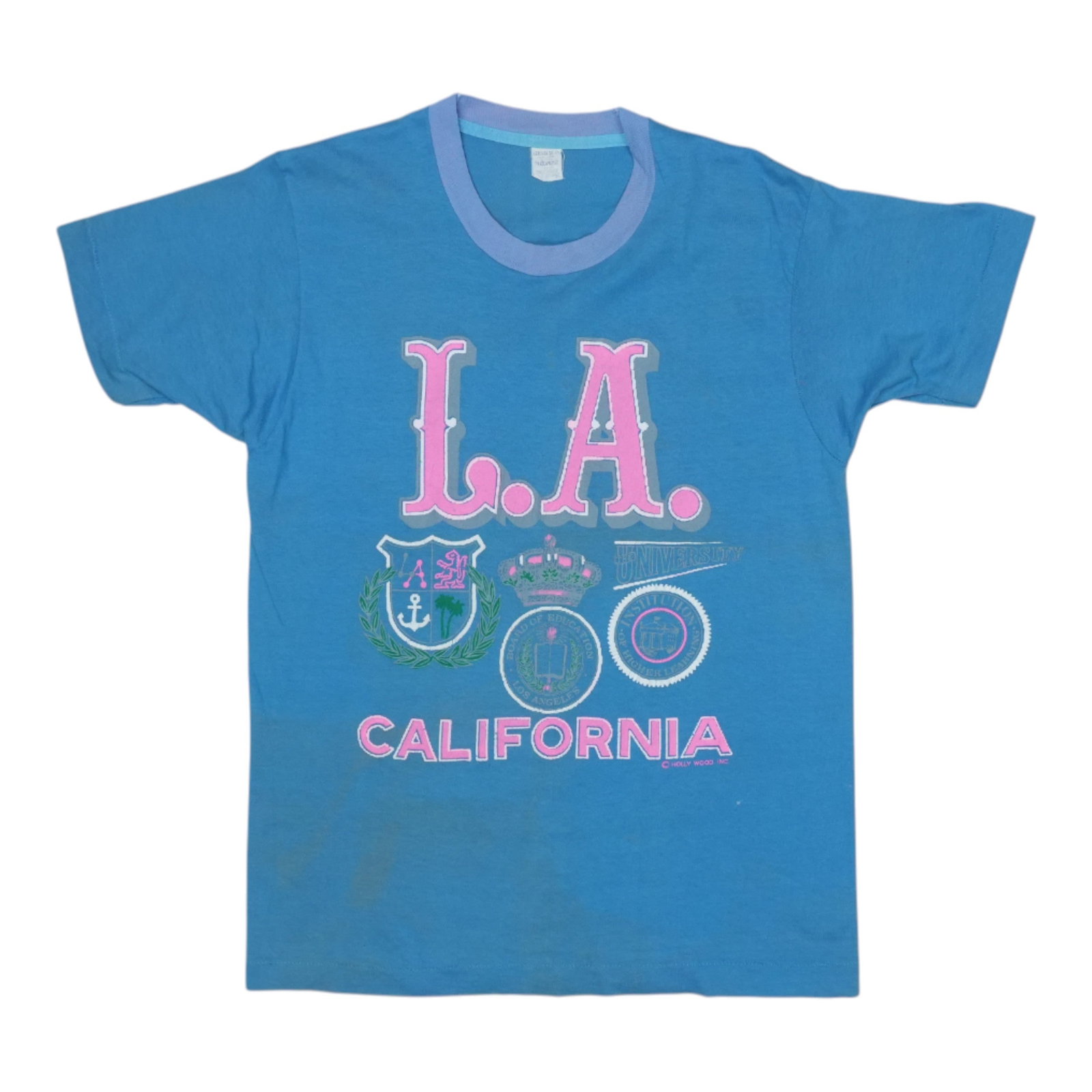 Vintage 1980s Blue Los Angeles California Poly Cotton T Shirt: Vintage 1980s Blue Los Angeles California Poly Cotton T Shirt This is an original vintage 1980s Los Angeles California shirt. It features front graphics only, with no graphics on the back. The shirt i