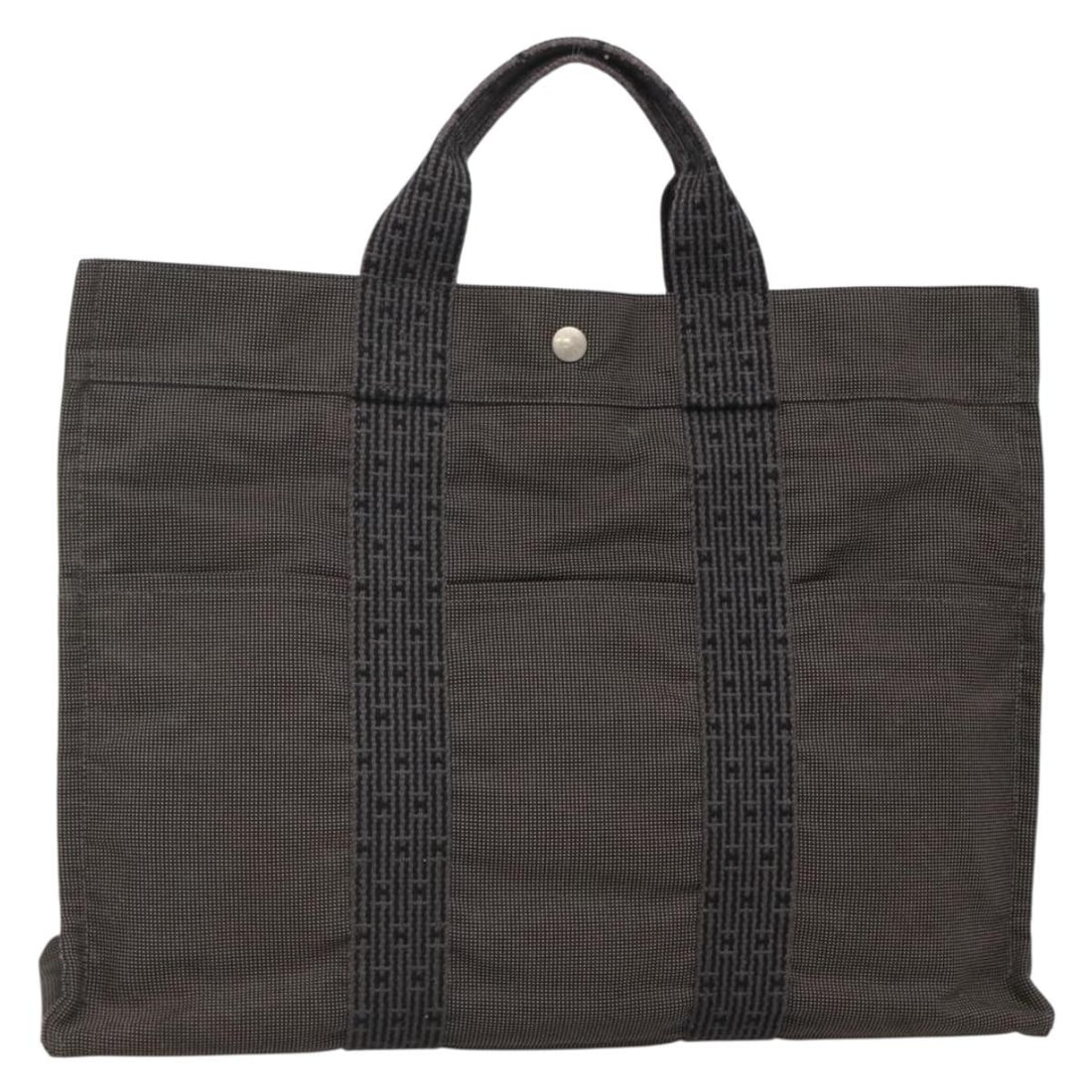Hermes Fourre-tout Herline Canvas Tote Bag Gray 42cm by 32cm by 10cm: Hermes Fourre-tout Herline Canvas Tote Bag Gray 42cm by 32cm by 10cm This Hermes Fourre-tout Herline handbag for women features a gray canvas body with metal fittings. It has a spacious design measuri