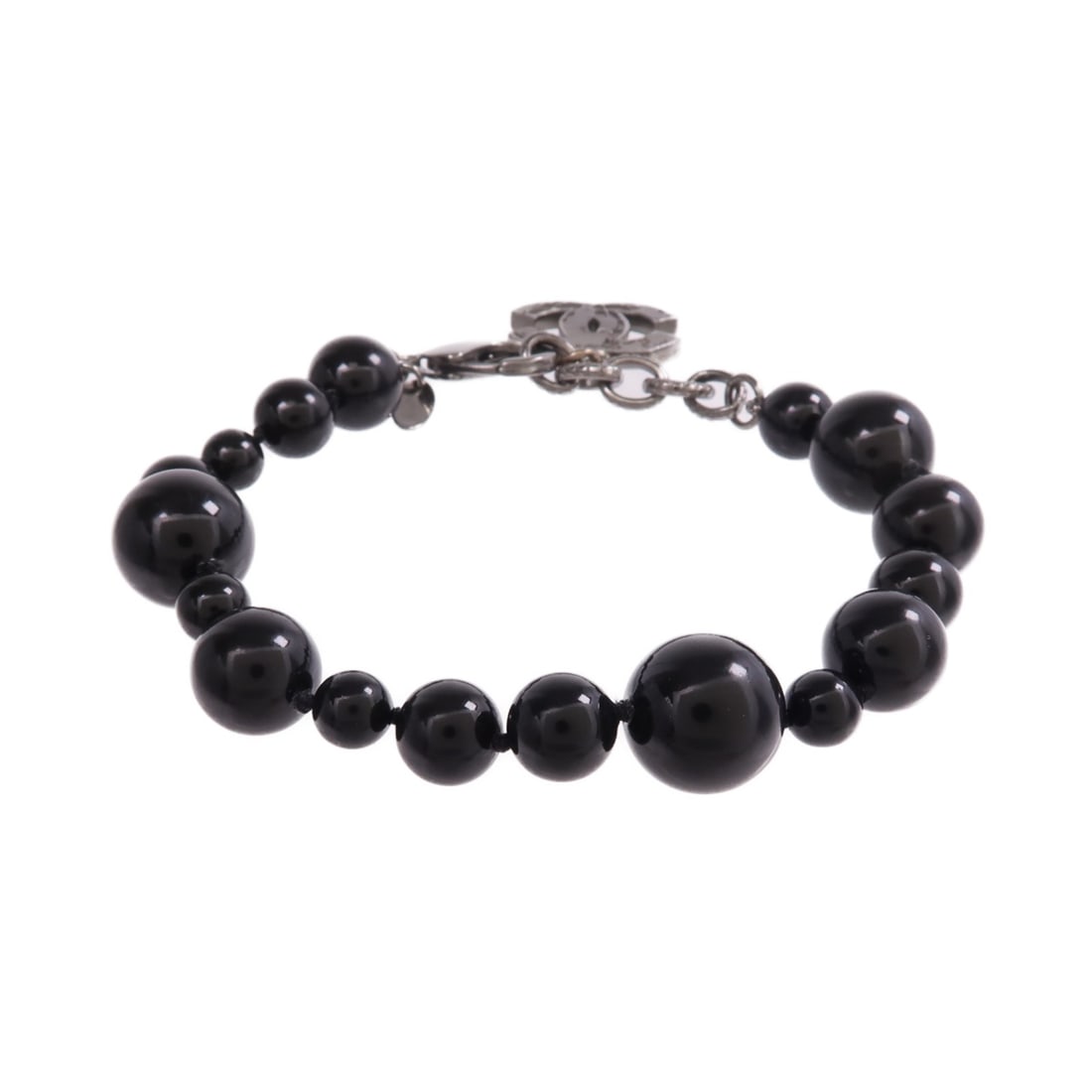 Black PVC Bracelet with CC Logo by Chanel: Black PVC Bracelet with CC Logo by Chanel This CHANEL CC bracelet features a black PVC construction and is designed for women. The bracelet does not include any stones and is crafted with non-metal ma