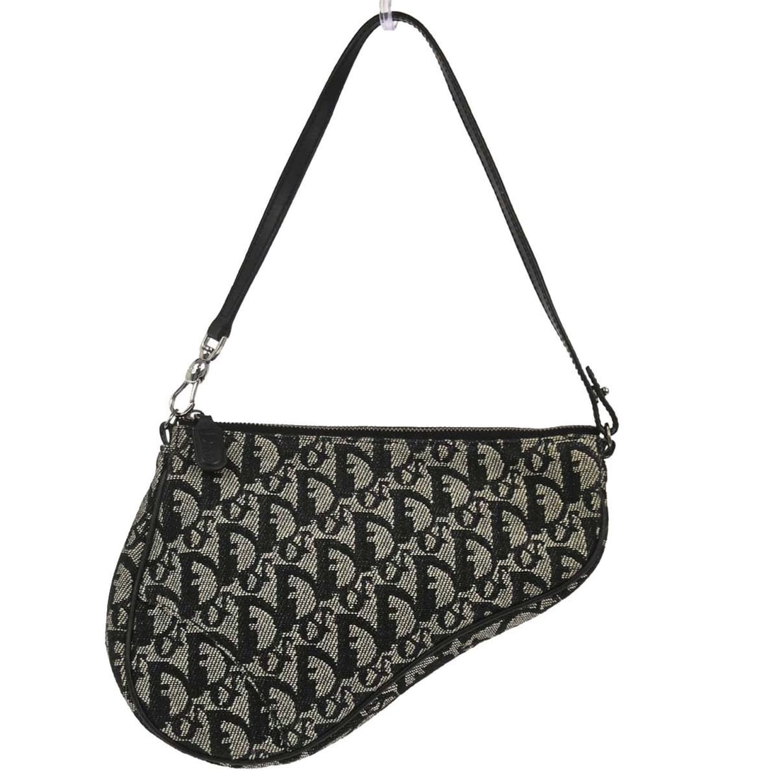 Dior Saddle Bag Black Canvas Leather MC0023 Small Handbag: Dior Saddle Bag Black Canvas Leather MC0023 Small Handbag This Christian Dior Saddle handbag features the iconic Trotter pattern in black canvas and leather. With a compact size, this small bag is des