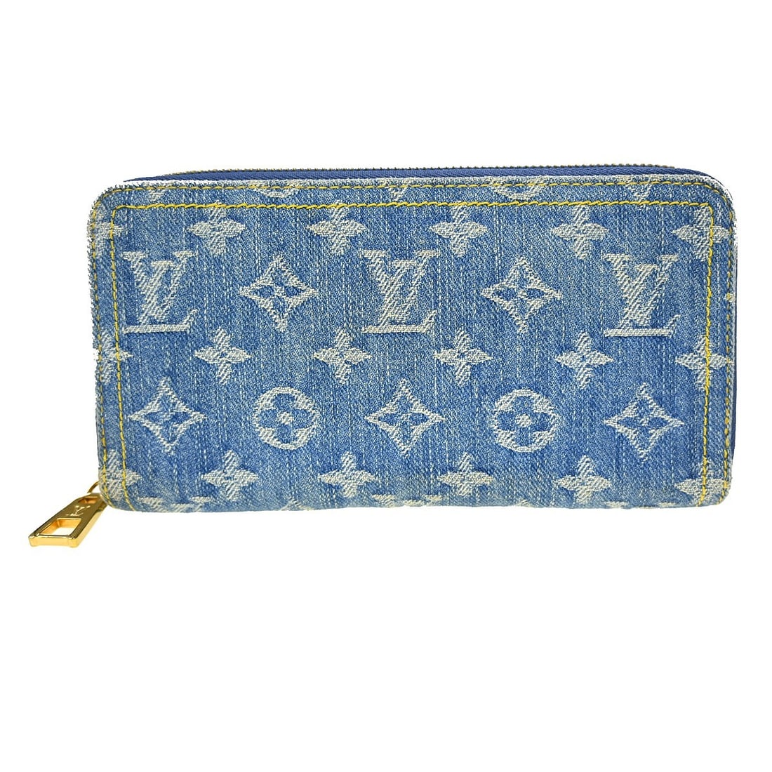 Blue Denim Monogram Zippy Wallet by Louis Vuitton Remix M82958: Blue Denim Monogram Zippy Wallet by Louis Vuitton Remix M82958 This Louis Vuitton Zippy Wallet features the iconic Monogram pattern in blue denim canvas. Designed for women, it offers a folding style 