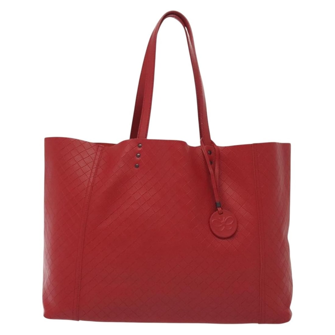 Bottega Veneta Red Leather Intrecciomirage Tote Bag: Bottega Veneta Red Leather Intrecciomirage Tote Bag This Bottega Veneta Intrecciomirage Tote is crafted from red leather with a distinctive woven design. Designed for women, it features a spacious int