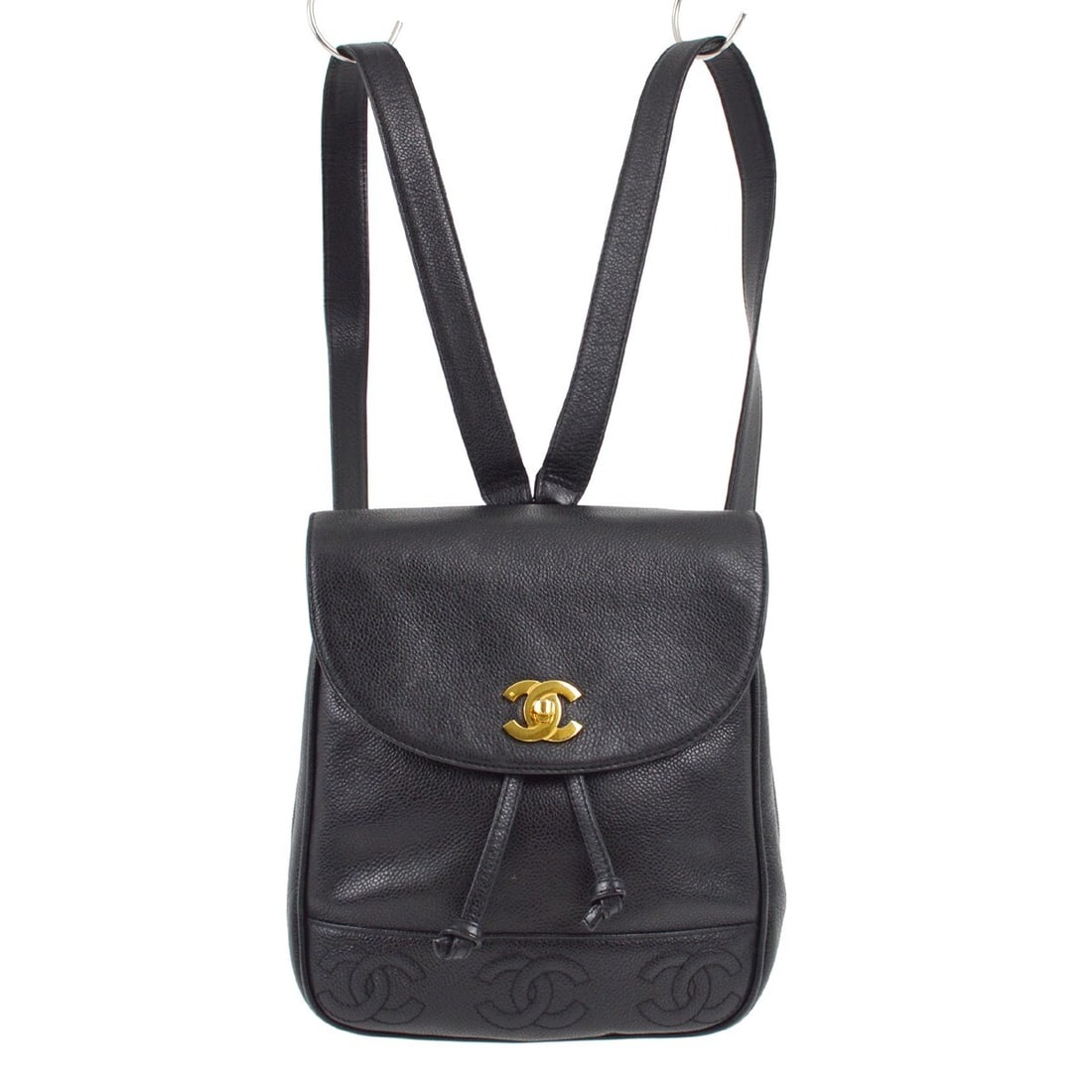 Black Caviar Leather Medium Backpack with Triple CC Logo by Chanel: Black Caviar Leather Medium Backpack with Triple CC Logo by Chanel This Chanel backpack features a medium-sized design crafted from black caviar skin leather with a distinctive triple CC turnlock clos