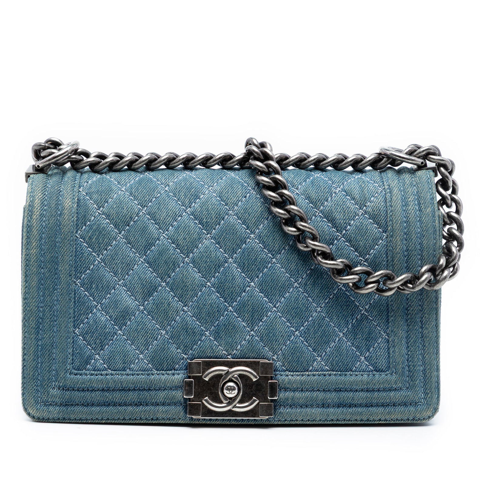 Chanel Boy Old Medium Blue Quilted Denim Shoulder Bag: Chanel Boy Old Medium Blue Quilted Denim Shoulder Bag This Chanel Old Medium Quilted Denim Boy Flap bag features a quilted denim exterior, a chain link shoulder strap, a front flap with a push-lock cl