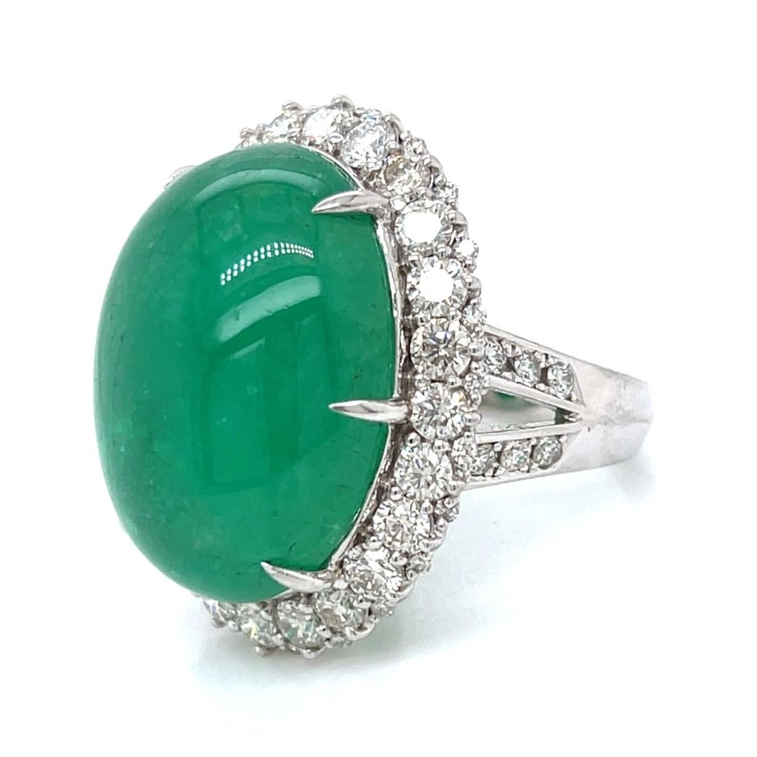 Platinum Certified 36.55 Ct Emerald Diamond Ring 60 Stones: Platinum Certified 36.55 Ct Emerald Diamond Ring 60 Stones This exquisite Platinum Certified ring features a stunning 36.55 Ct. Emerald Cabochon, certified by Gem Research Japan. The emerald is beauti