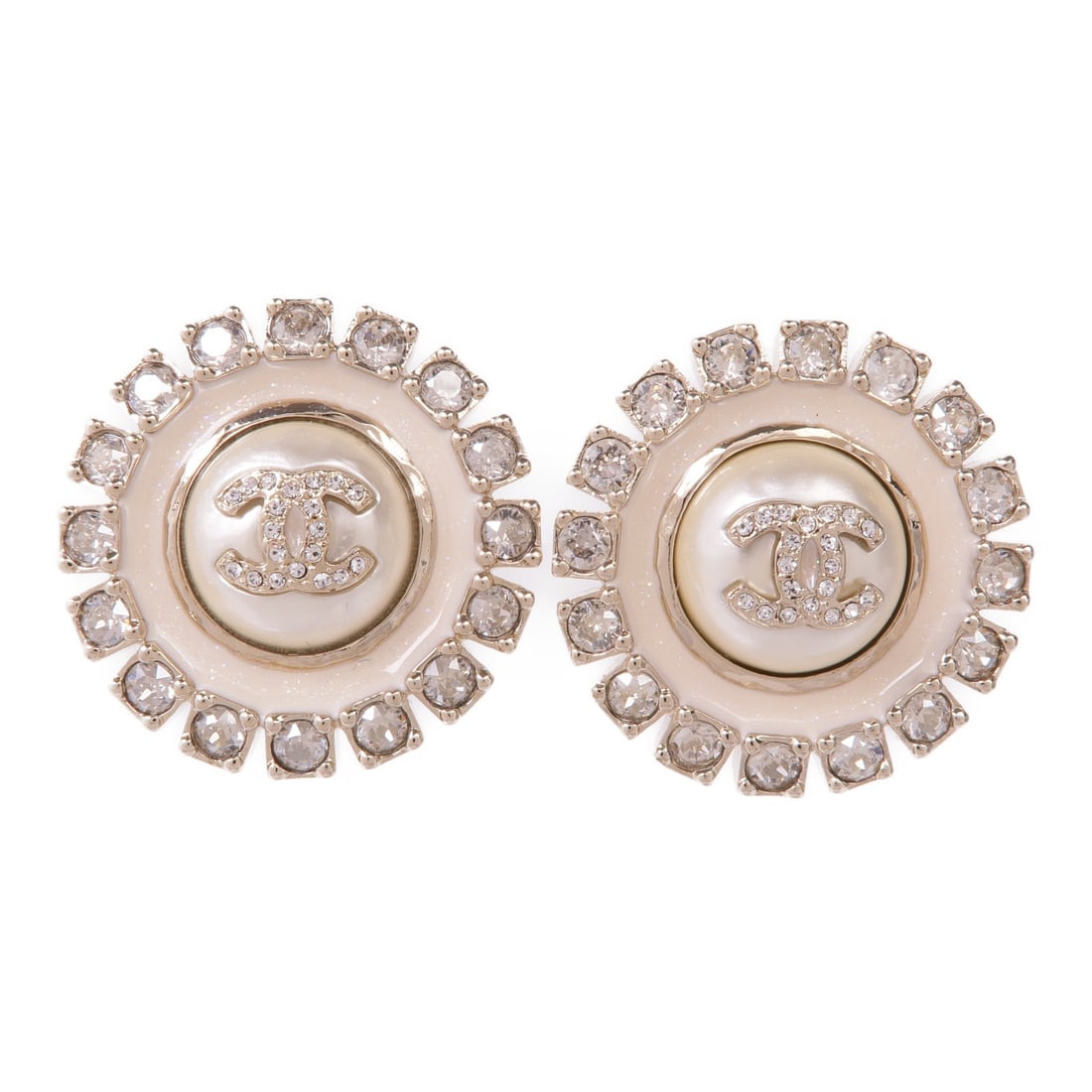 CHANEL Gold and Clear Metal CC Pierced Earrings: CHANEL Gold and Clear Metal CC Pierced Earrings These exquisite CHANEL CC earrings are a stunning addition to any jewelry collection. Designed as pierced earrings, they feature a clear and elegant aes