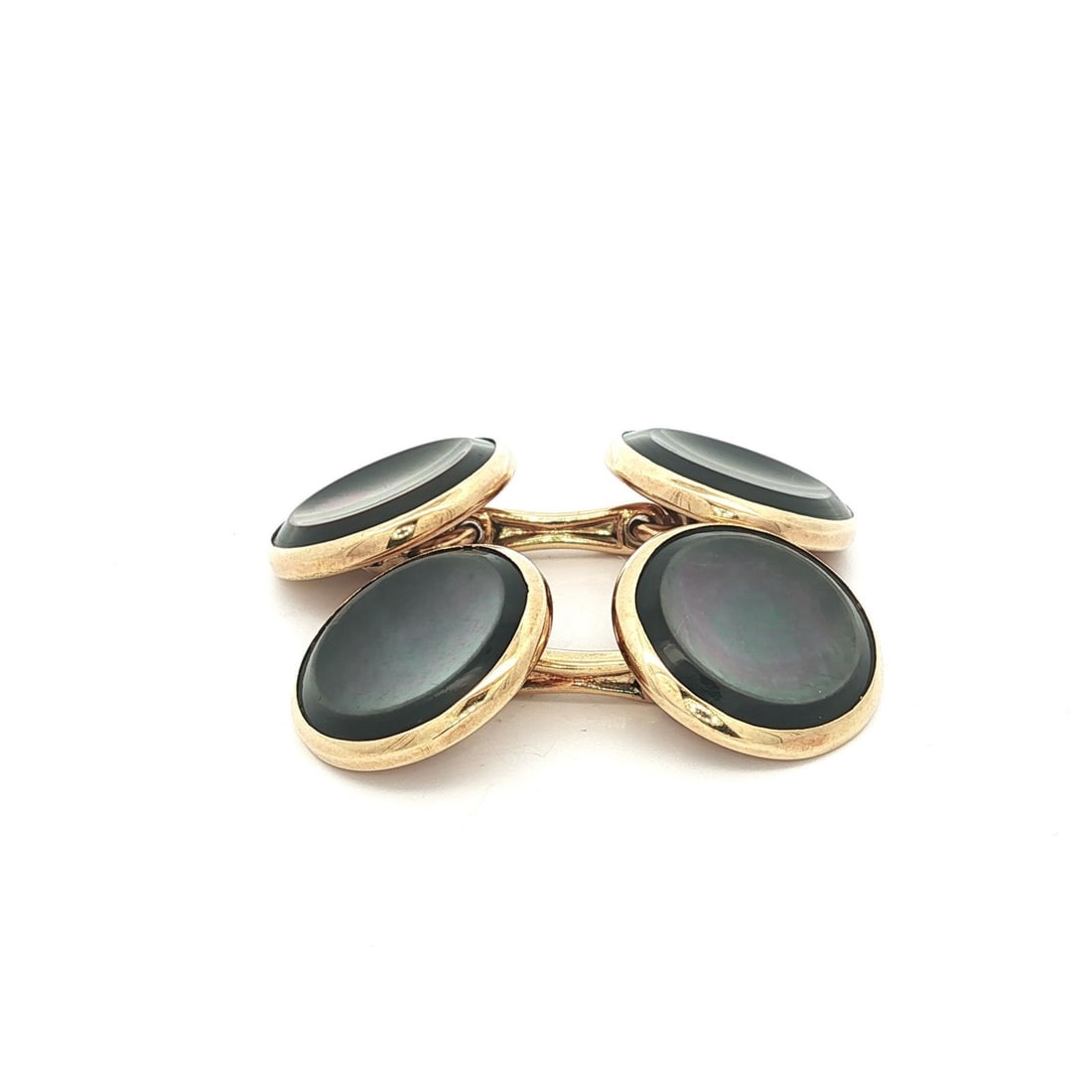 Tiffany & Co. 14k Yellow Gold Gray Mother Of Pearl Cufflinks: Tiffany & Co. 14k Yellow Gold Gray Mother Of Pearl Cufflinks Elevate your formal attire with these vintage cufflinks from Tiffany & Co., expertly crafted in solid 14k yellow gold. Featuring four natur