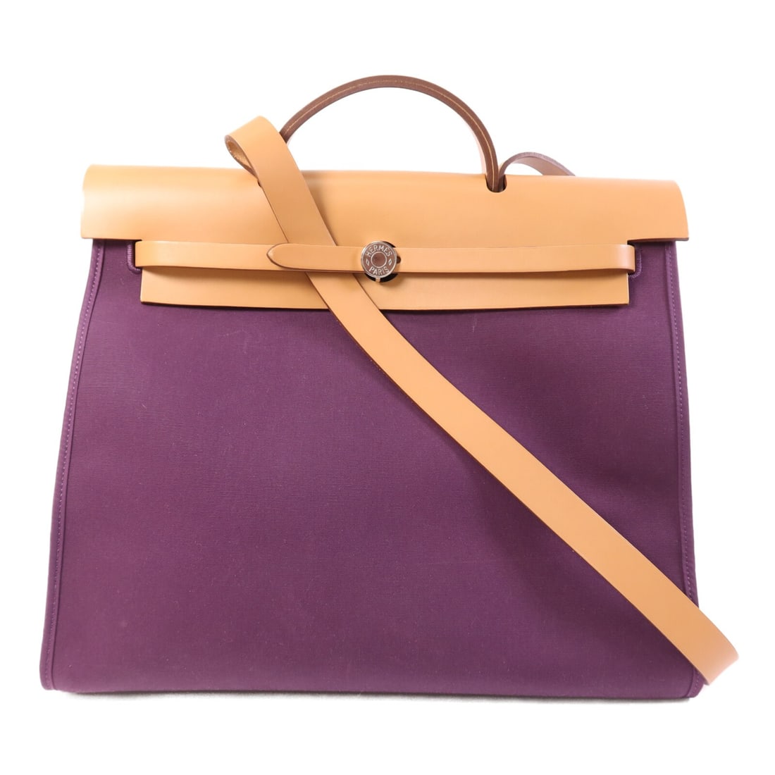 Herbag MM Purple Canvas and Leather Two-Way Shoulder Bag by Hermes: Herbag MM Purple Canvas and Leather Two-Way Shoulder Bag by Hermes Hermes Herbag MM 2-way shoulder bag crafted in canvas with leather trim, featuring a purple exterior and palladium hardware. Designed