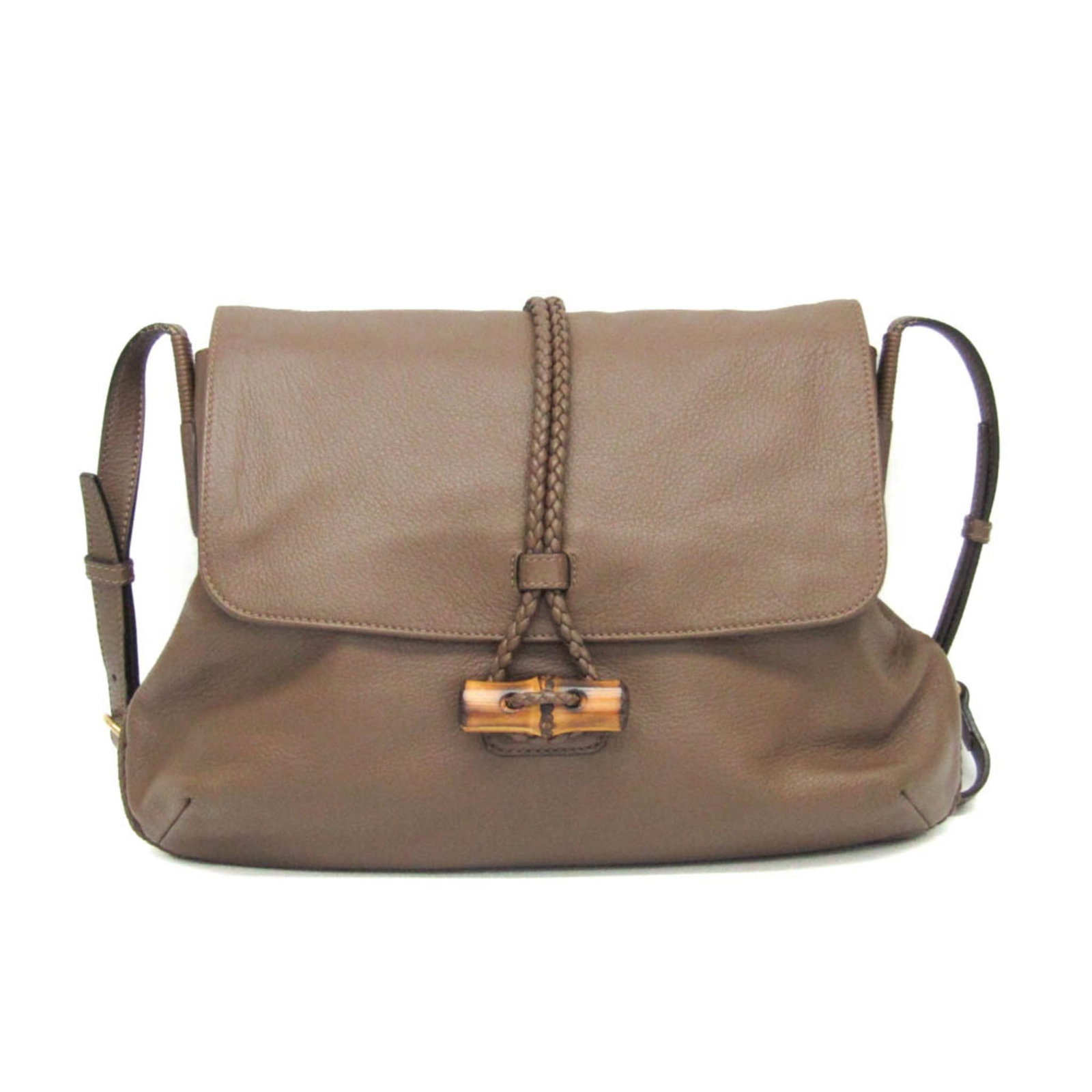 Gucci Brown Leather Bamboo Shoulder Purse for Women: Gucci Brown Leather Bamboo Shoulder Purse for Women The Gucci Bamboo Shoulder Bag is crafted from brown leather and designed for women. Featuring iconic bamboo accents, this bag is made in Italy and o