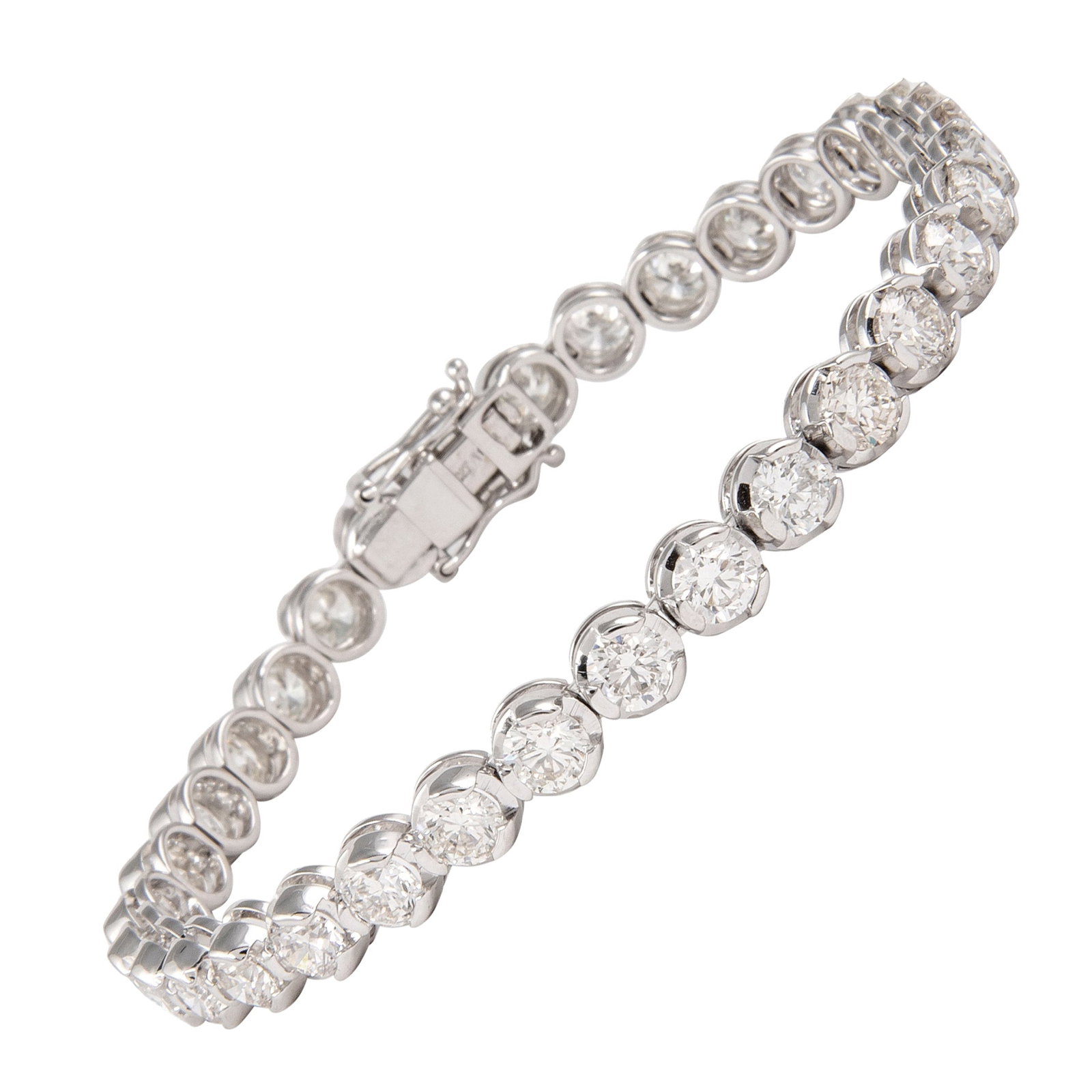10.14ct Diamond Tennis Bracelet in 18k White Gold: 10.14ct Diamond Tennis Bracelet in 18k White Gold This stunning tennis bracelet features 33 round brilliant diamonds totaling 10.14 carats, each exhibiting an approximate G color and VS1 clarity. The 