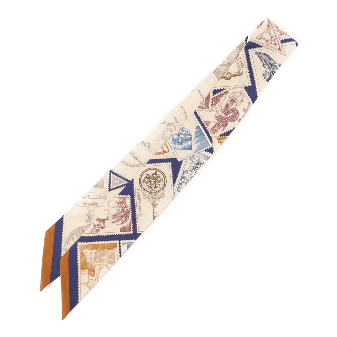 Silk Women's Twilly Scarf in White Blue and Brown by Hermes: Silk Women's Twilly Scarf in White Blue and Brown by Hermes This Hermes Twilly scarf is crafted from silk in a white, blue, and brown color scheme. Designed for women, it features a regular size and i