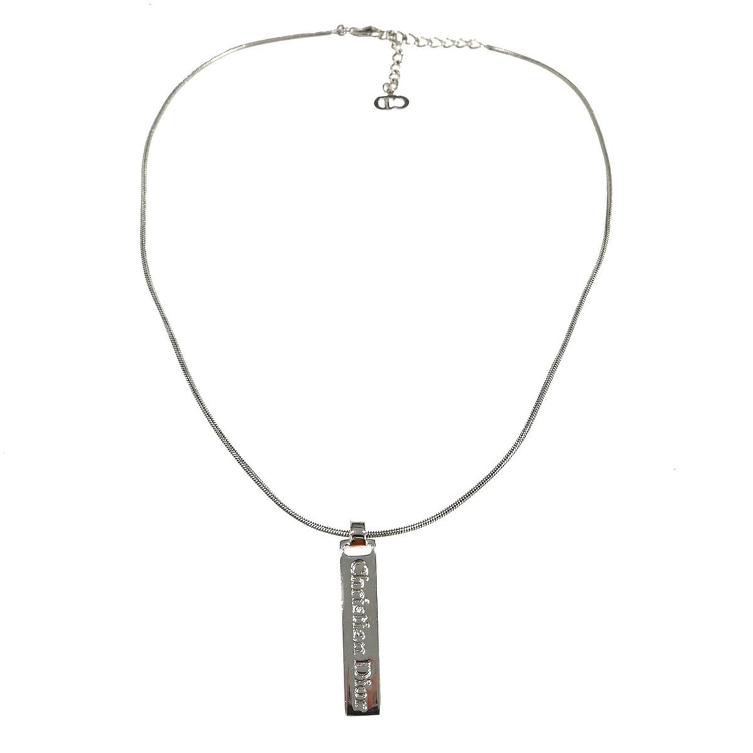 Dior Vintage Silver Tone Pendant Necklace with Charm: Dior Vintage Silver Tone Pendant Necklace with Charm This vintage Christian Dior necklace features a silver-toned pendant charm with a stylish design. The necklace is in very good condition and showca