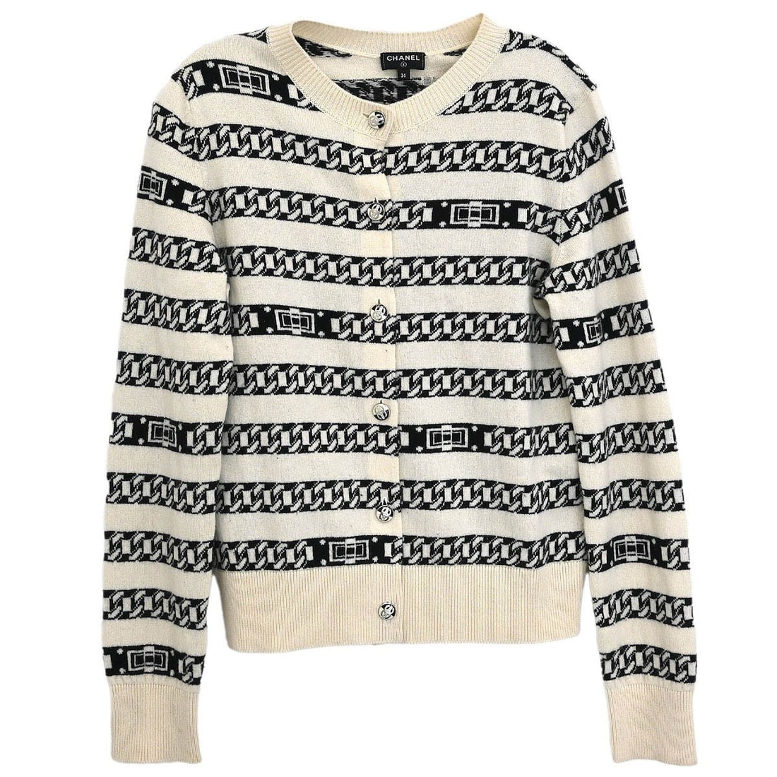 Chanel White Cashmere Cardigan P56113K07327 Vintage #36: Chanel White Cashmere Cardigan P56113K07327 Vintage #36 This elegant Chanel cardigan in a pristine white color features long sleeves and a classic button accent, making it perfect for casual occasions