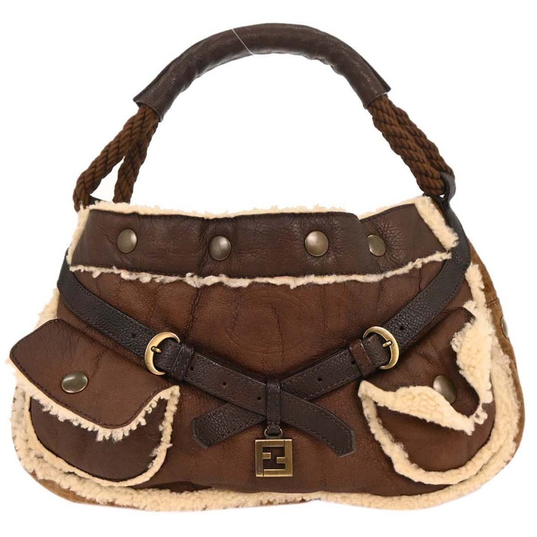Fendi Brown Leather Zucchino Shearling Handbag 2288-8BR519-TE5-059: Fendi Brown Leather Zucchino Shearling Handbag 2288-8BR519-TE5-059 This stylish Fendi handbag features a luxurious brown leather exterior adorned with the iconic Zucchino pattern and shearling accents