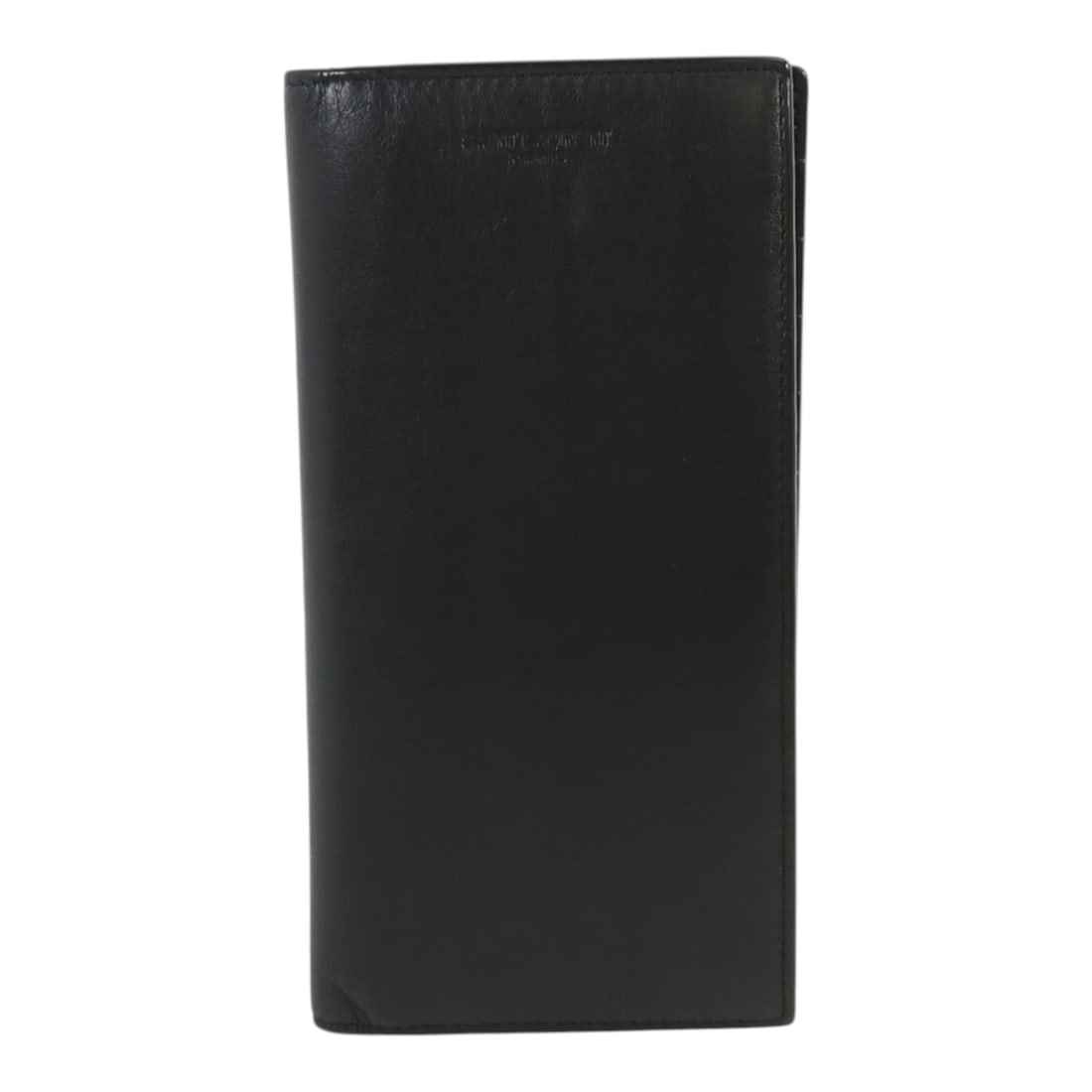 YSL Calfskin Bifold Wallet in Black Leather: YSL Calfskin Bifold Wallet in Black Leather This Saint Laurent bifold wallet is crafted from black calfskin leather and features a sleek, understated design. Made in Italy, it is designed for men and 