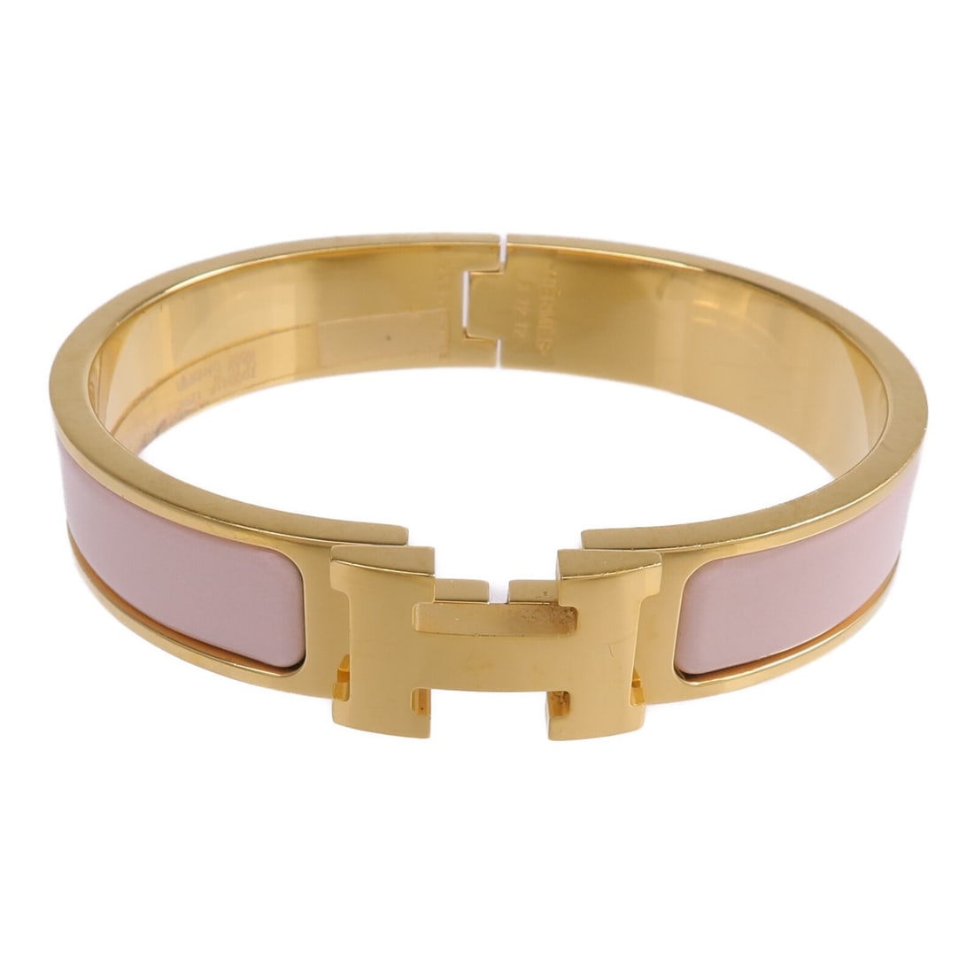 Hermes Clic H Pink Enamel Gold Tone Bracelet for Women: Hermes Clic H Pink Enamel Gold Tone Bracelet for Women This Hermes Clic H bracelet features gold-tone enamel and is designed for women. Crafted in France, it showcases a distinctive pink and gold colo