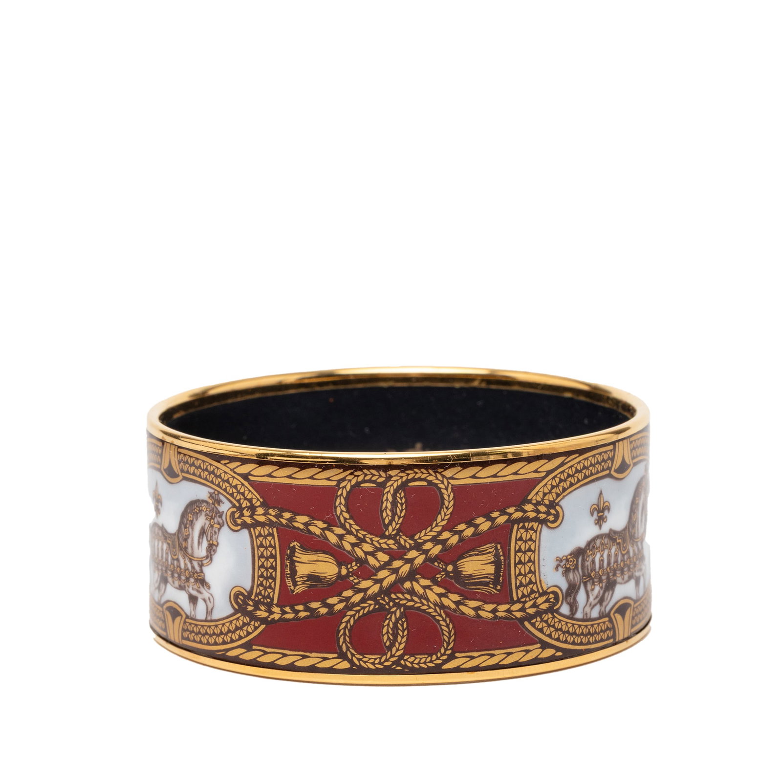 Grand Apparat Red Enamel 70mm Wide Bangle by Hermes: Grand Apparat Red Enamel 70mm Wide Bangle by Hermes This Hermes Extra Wide Enamel Grand Apparat Bracelet 70 features a printed enamel design with a gold-plated metal body. The bracelet is presented in