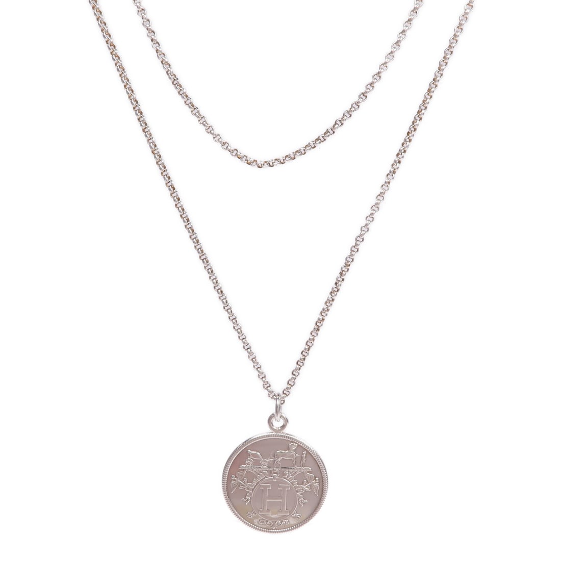 Ex Libris MM Pendant Necklace in 925 Silver and 18K Pink Gold by Hermes: Ex Libris MM Pendant Necklace in 925 Silver and 18K Pink Gold by Hermes This Hermes Ex Libris MM necklace is crafted from 925 sterling silver and features 18K pink gold accents. Designed for women, th