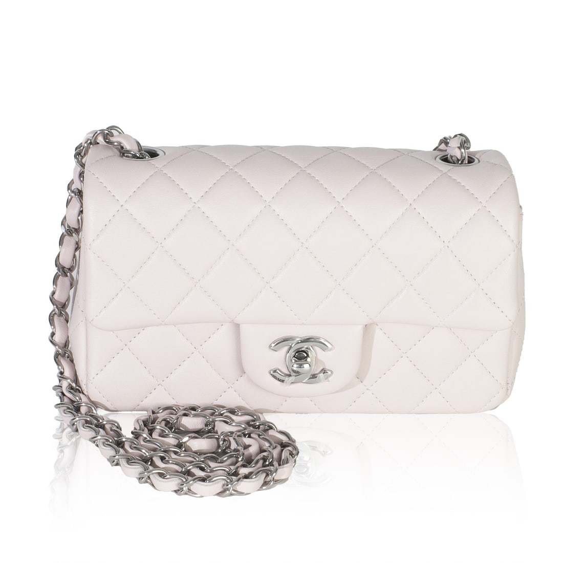Chanel Mini Flap Purple Quilted Lambskin Leather Shoulder Bag: Chanel Mini Flap Purple Quilted Lambskin Leather Shoulder Bag This Chanel Mini Flap shoulder bag is crafted from violet clair quilted lambskin leather with matching purple leather lining. It features 