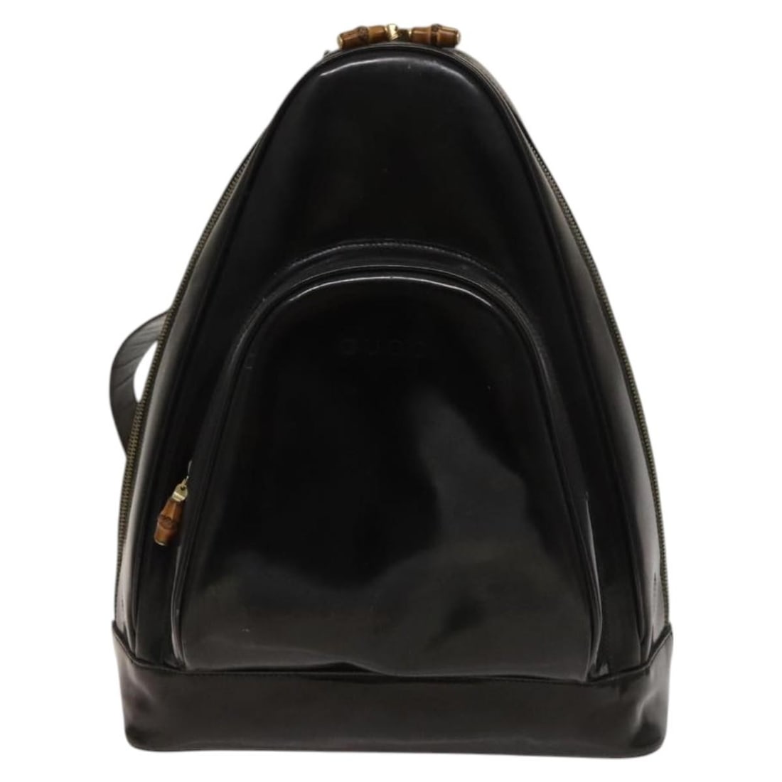 Gucci Black Patent Leather Vintage Bamboo Backpack Italy: Gucci Black Patent Leather Vintage Bamboo Backpack Italy This Gucci Vintage Bamboo Backpack is crafted from black patent leather and features the iconic bamboo handle design. Designed for women, it of