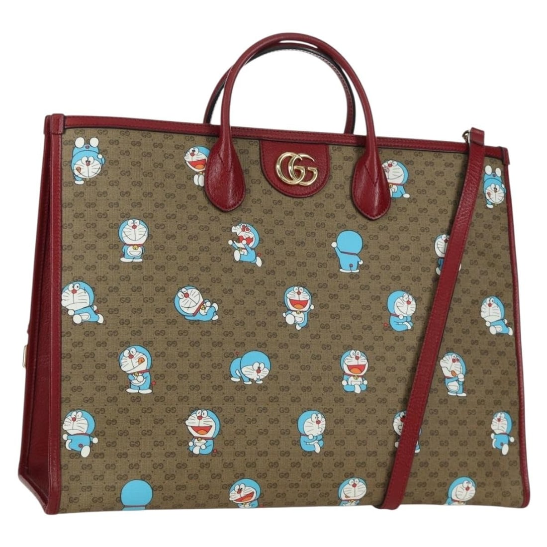 Gucci Doraemon Mini GG Beige Canvas Tote Bag from Italy: Gucci Doraemon Mini GG Beige Canvas Tote Bag from Italy This Gucci Doraemon Tote is crafted from beige printed mini GG coated canvas and is designed for women. Made in Italy, the tote features a spaci