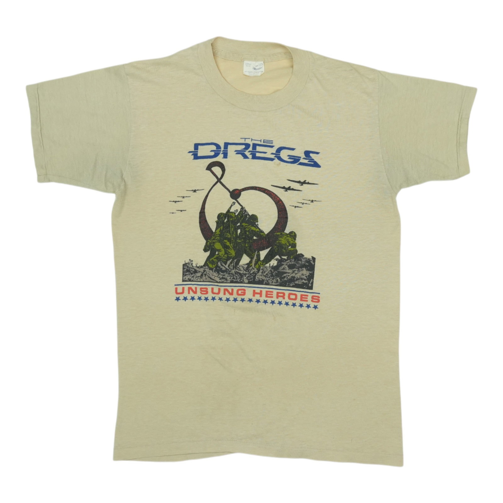 Vintage 1980s Tan The Dreggs Unsung Heroes Poly Cotton Graphic Shirt: Vintage 1980s Tan The Dreggs Unsung Heroes Poly Cotton Graphic Shirt This is an original vintage 1980s The Dreggs Unsung Heroes shirt featuring front and back graphics. Made from a 50/50 poly/cotton b