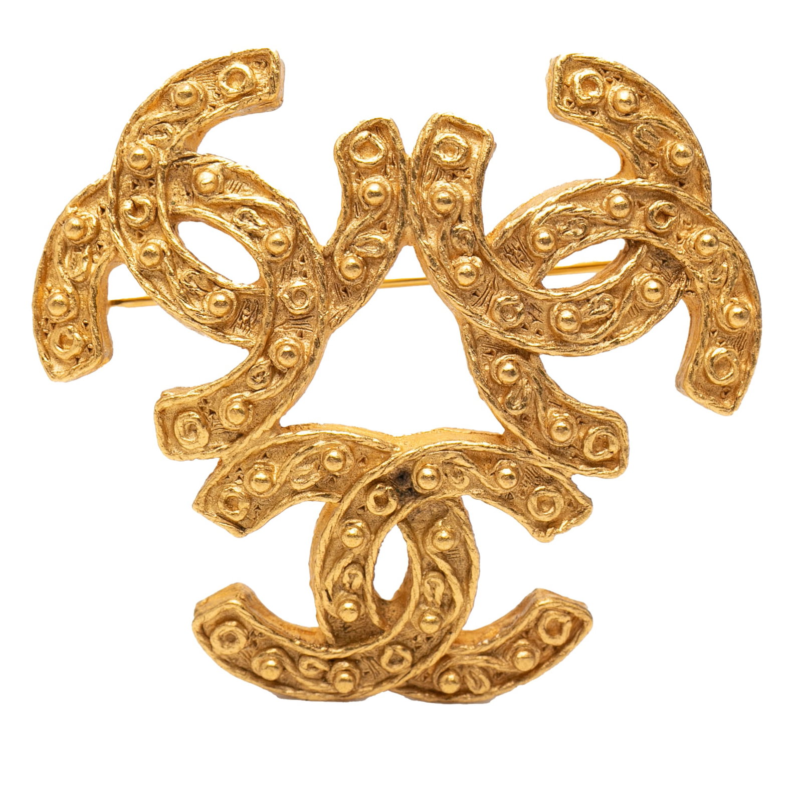 Chanel Costume Brooch Gold Tone Metal Triple CC Design: Chanel Costume Brooch Gold Tone Metal Triple CC Design This Chanel brooch features a gold tone metal body with a distinctive triple CC design and a back pin closure. Made in France, it is categorized 
