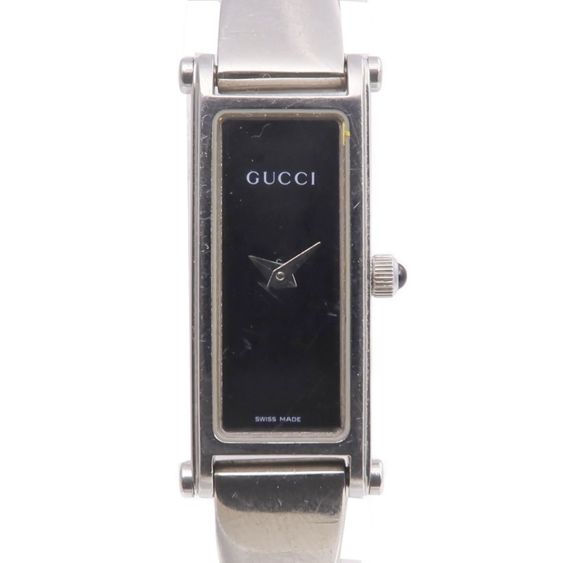 Gucci 1500L Black Stainless Steel Bangle Wrist Watch: Gucci 1500L Black Stainless Steel Bangle Wrist Watch This Gucci 1500L bangle wristwatch features a sleek black dial and frame, complemented by a stainless steel band. Designed for women, it showcases 