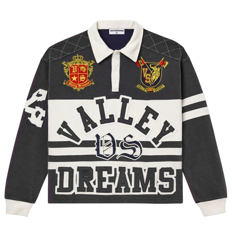 Large Black Cotton Rugby Shirt by Vale Dreams: Large Black Cotton Rugby Shirt by Vale Dreams The Vale Dreams Black Rugby Shirt offers a classic rugby style with bold black stripes and a comfortable fit. Made from premium, breathable cotton, it is 