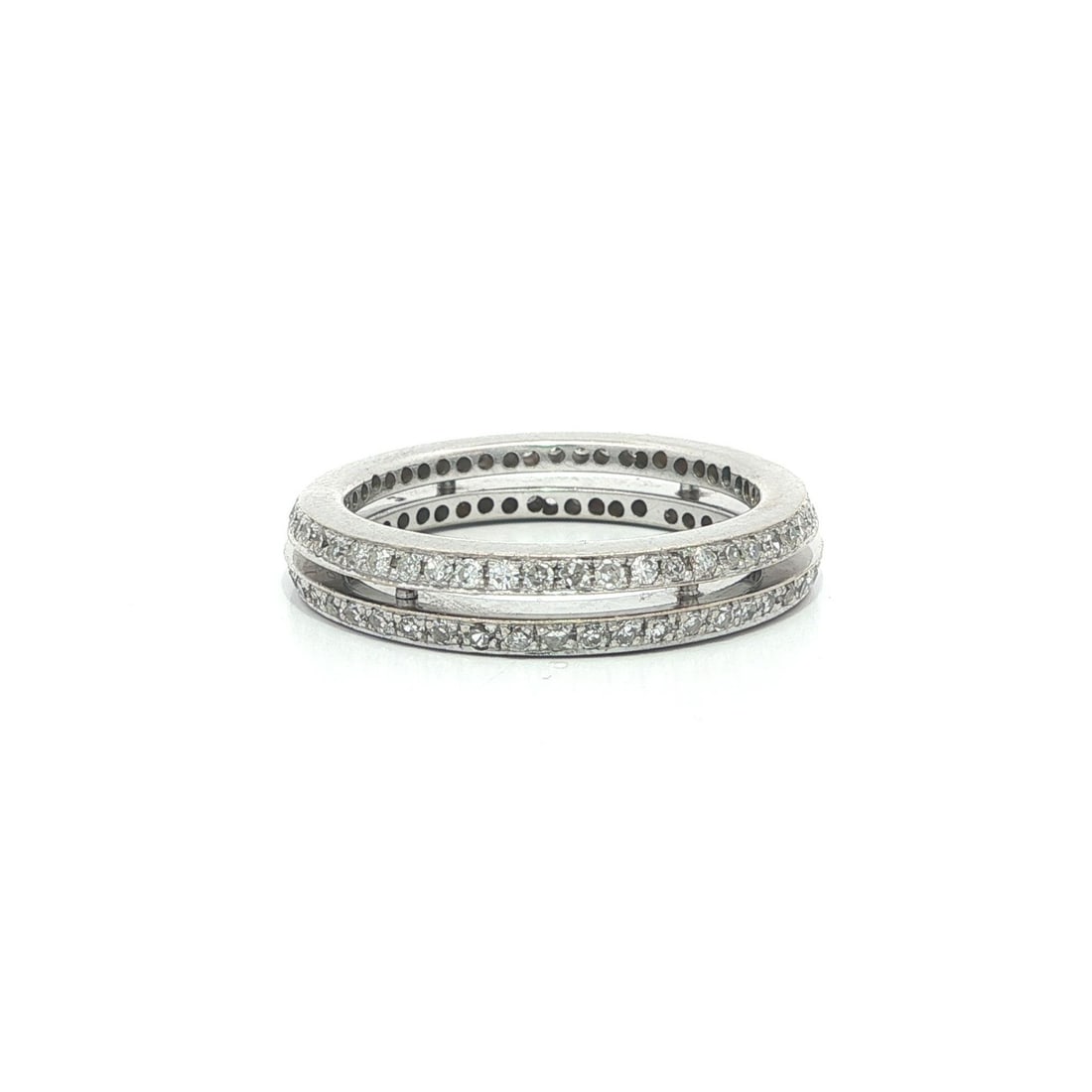 1ctw Single Cut Diamond Eternity Band in Vintage 18k White Gold: 1ctw Single Cut Diamond Eternity Band in Vintage 18k White Gold This vintage eternity band ring features a stack-look design crafted from solid 18k white gold. The ring is set with numerous natural, s