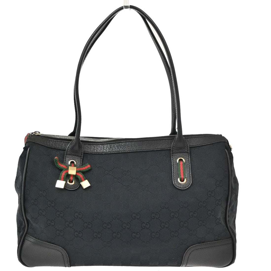 Princy Black Canvas Tote by Gucci 36cm x 32cm x 12cm: Princy Black Canvas Tote by Gucci 36cm x 32cm x 12cm This Gucci Princy Tote is crafted from black canvas and designed for women. It features the iconic GG canvas pattern and is made in Italy. The tote