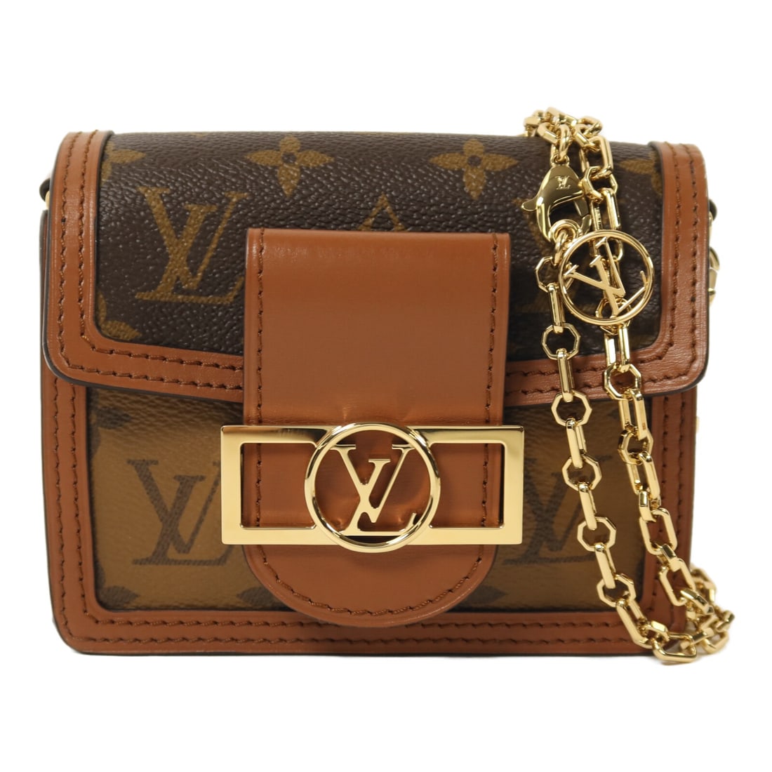 Louis Vuitton Micro Dauphine Monogram Reverse Shoulder Bag with Gold Hardware: Louis Vuitton Micro Dauphine Monogram Reverse Shoulder Bag with Gold Hardware This Louis Vuitton Micro Dauphine Chain Shoulder Bag features the iconic Monogram Reverse pattern in brown PVC coated canv
