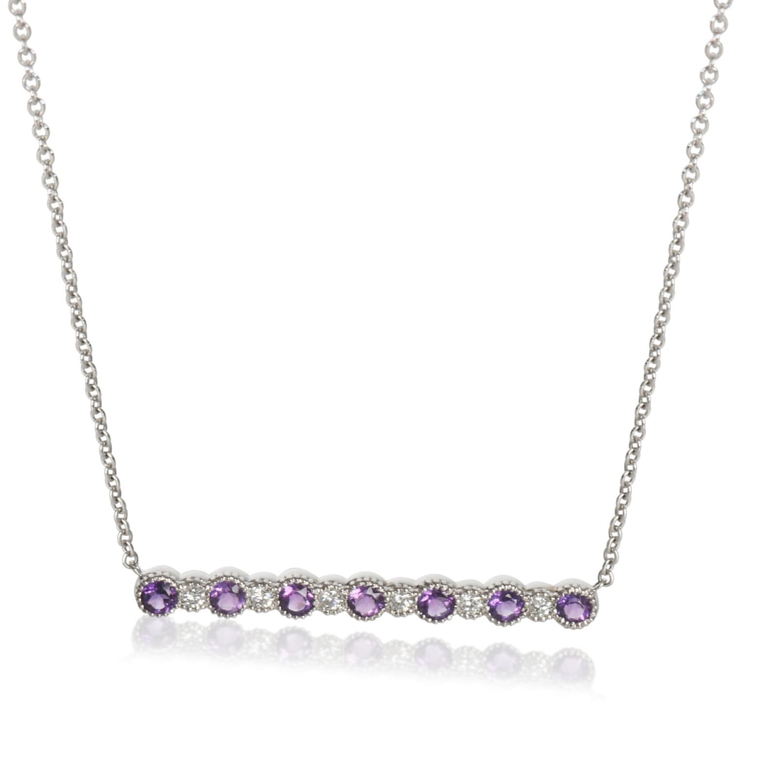 14K White Gold Amethyst Diamond Pendant Unisex Jewelry: 14K White Gold Amethyst Diamond Pendant Unisex Jewelry This elegant pendant features a stunning round brilliant amethyst, complemented by shimmering diamonds. Crafted from high-quality 14K white gold,