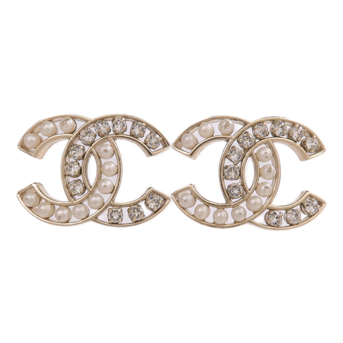 Gold Tone Pierced Earrings with CC Motif by CHANEL: Gold Tone Pierced Earrings with CC Motif by CHANEL These CHANEL CC earrings feature a classic gold-tone design crafted for pierced ears. Designed for women, these earrings do not include any stones an