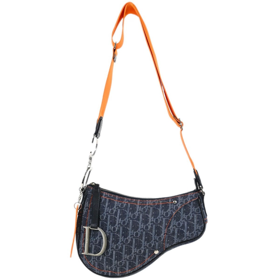 Christian Dior Navy Denim Trotter Saddle Shoulder Bag 08-RU-1005: Christian Dior Navy Denim Trotter Saddle Shoulder Bag 08-RU-1005 This stylish Christian Dior Trotter Flight Saddle Shoulder Bag is crafted from high-quality navy denim, making it a versatile addition 