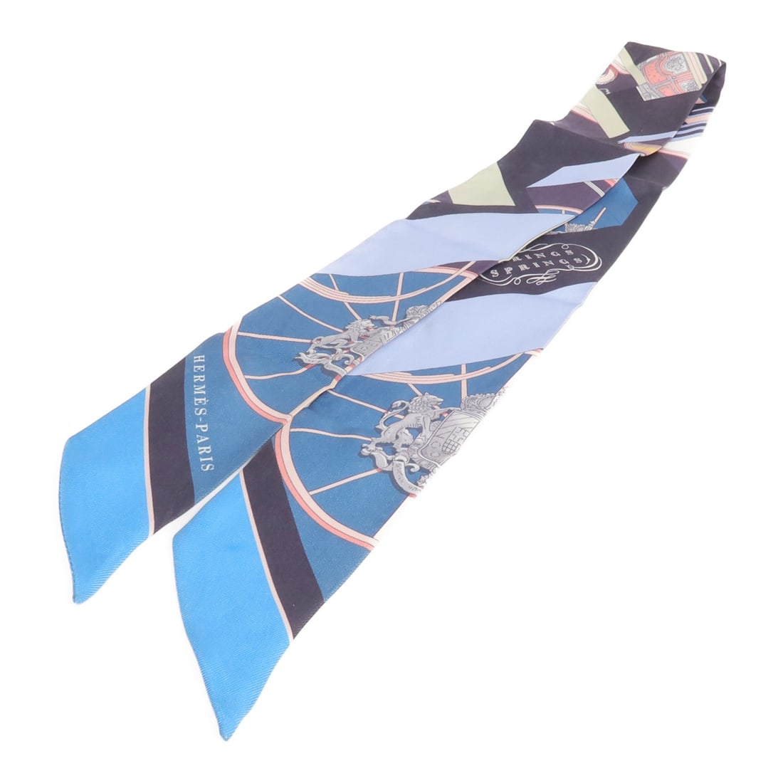Blue Silk Twilly Scarf by Hermes for Women: Blue Silk Twilly Scarf by Hermes for Women This Hermes Twilly scarf is crafted from luxurious silk in a blue color. Designed for women, it offers a versatile accessory option with a classic style. Spe