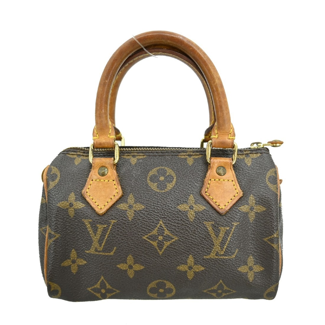 Louis Vuitton Mini Speedy Monogram Canvas Brown Handbag M41534: Louis Vuitton Mini Speedy Monogram Canvas Brown Handbag M41534 This Louis Vuitton Mini Speedy handbag features the iconic monogram canvas leather exterior in brown. Designed for women, this vintage pi