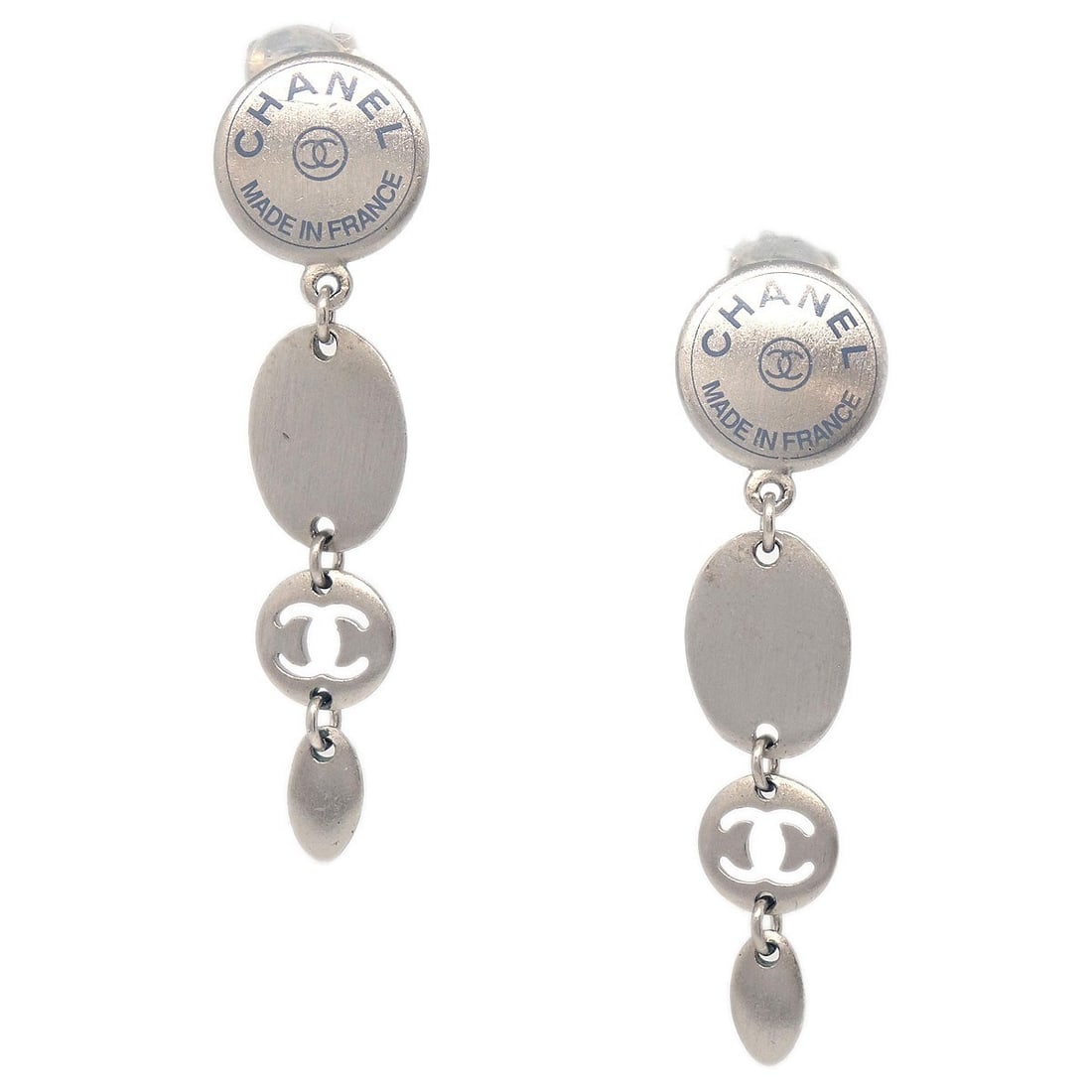 Chanel Silver Plated Dangle Clip-On Earrings 99A Collection: Chanel Silver Plated Dangle Clip-On Earrings 99A Collection These Chanel dangle button clip-on earrings feature a silver-plated finish and a classic drop design. Crafted in France, they offer a sophis