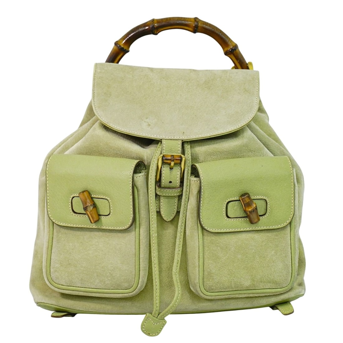 Green Suede Gucci Bamboo Backpack Vintage Italian Bag 30cm: Green Suede Gucci Bamboo Backpack Vintage Italian Bag 30cm This Gucci Vintage Bamboo Backpack features a green suede exterior and is designed for women. It showcases Gucci's iconic bamboo handle detai
