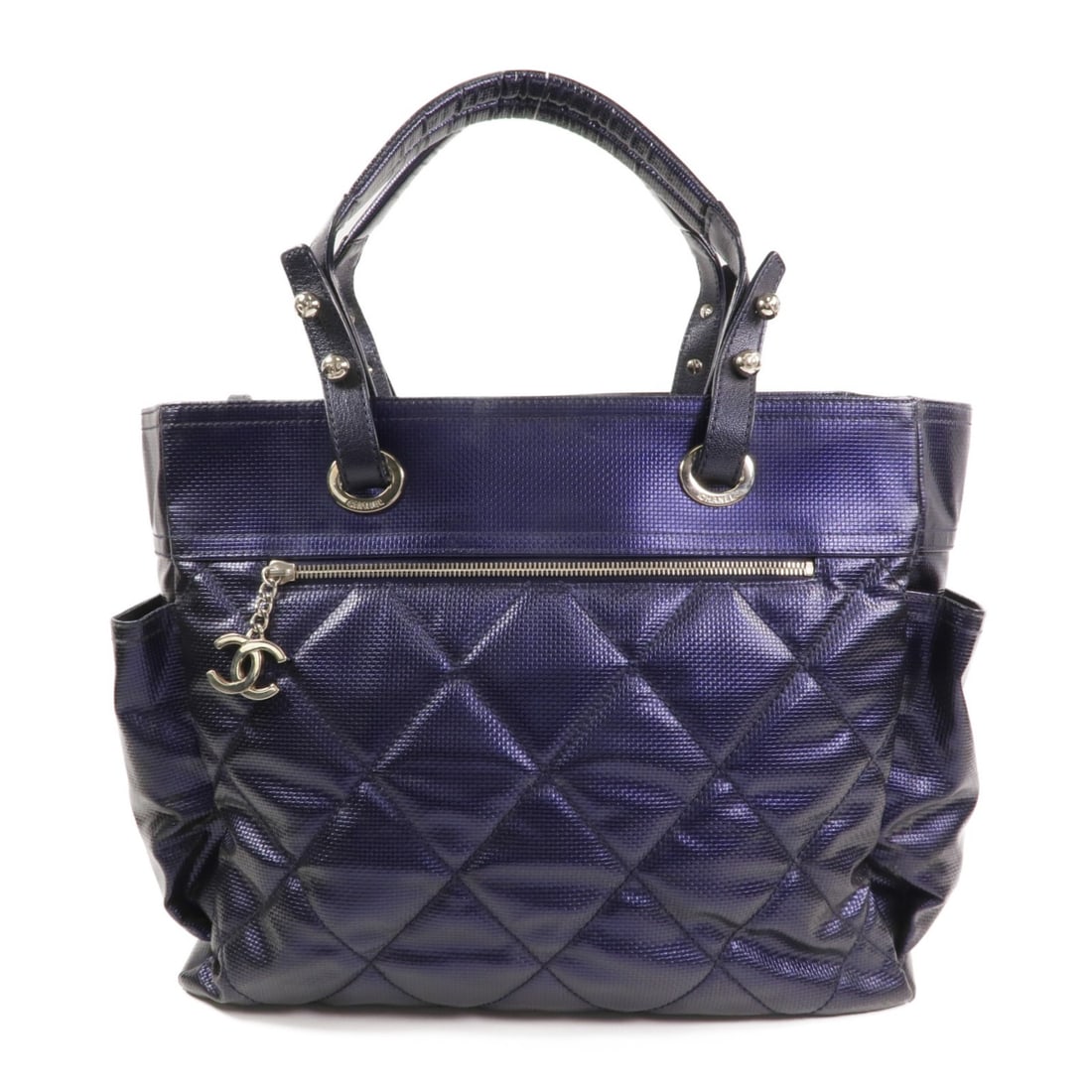 CHANEL Biarritz Tote Bag Coated Canvas Purple SHW France: CHANEL Biarritz Tote Bag Coated Canvas Purple SHW France Introducing the CHANEL CC SHW Paris Biarritz Tote Bag, a stylish and functional accessory made from durable PVC coated canvas in a striking pur