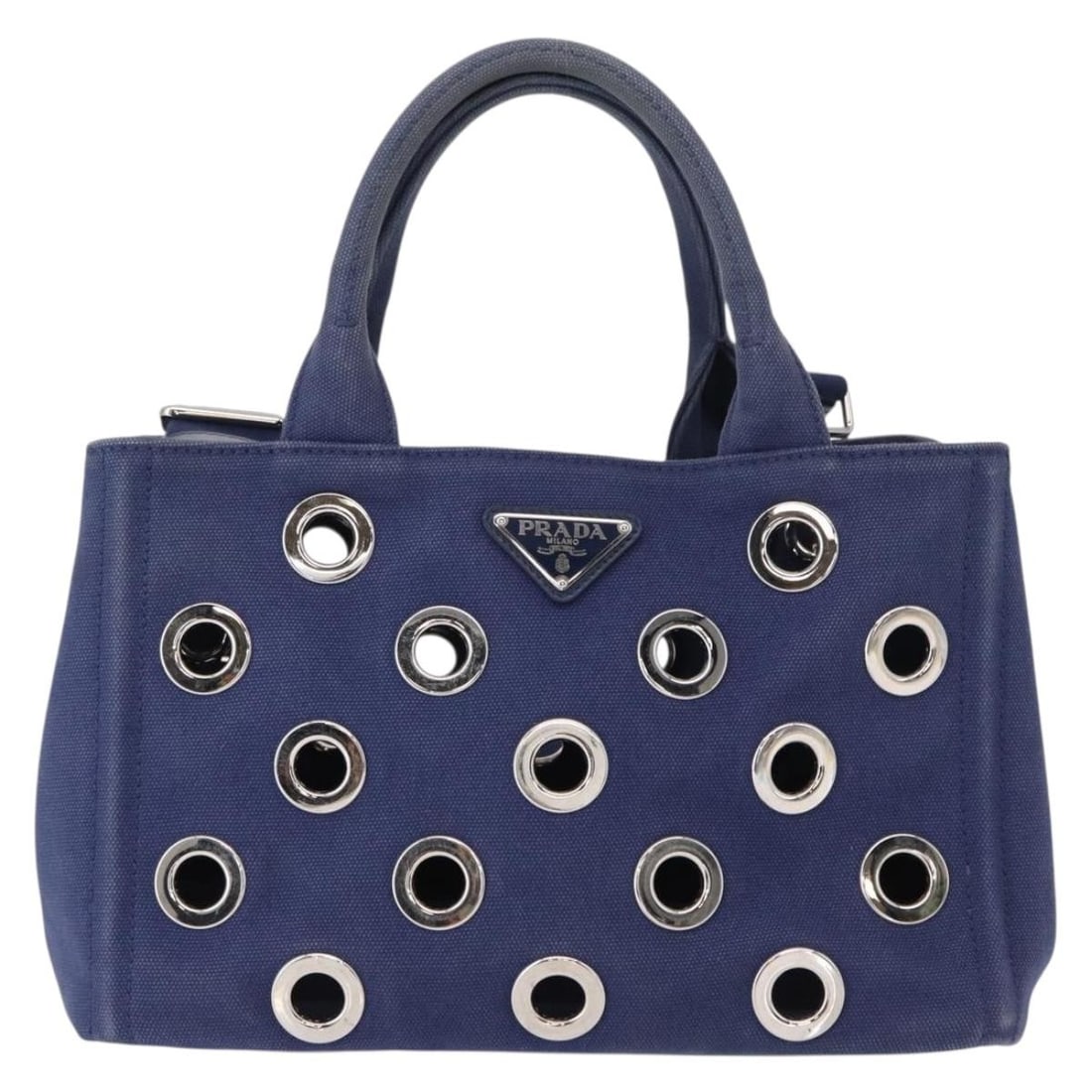 Blue Canvas Tote with Grommet Details Prada Canapa Convertible: Blue Canvas Tote with Grommet Details Prada Canapa Convertible This Prada Canapa Convertible Tote features grommet embellishments and is crafted from blue canvas. Designed for women, it offers versati