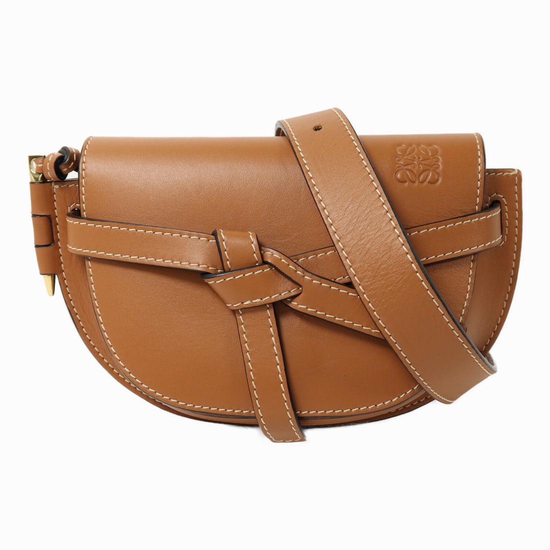 Mini Gate Shoulder Bag by Loewe in Brown Calfskin with Gold Hardware: Mini Gate Shoulder Bag by Loewe in Brown Calfskin with Gold Hardware This LOEWE Mini Gate shoulder bag is crafted from brown calfskin leather, featuring a compact design ideal for everyday use. The ba