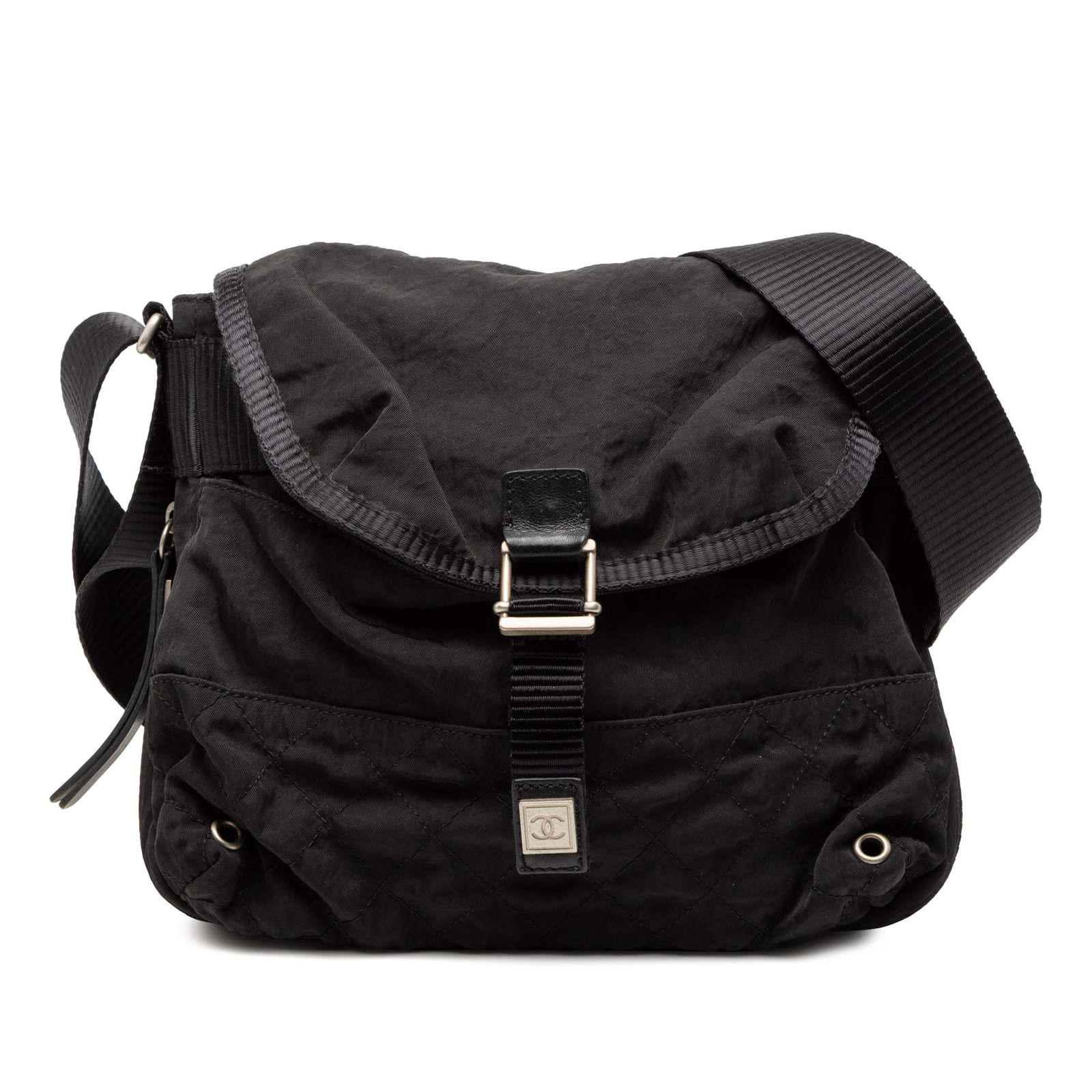 Chanel Sport Line Black Nylon Crossbody Bag with Buckle Flap: Chanel Sport Line Black Nylon Crossbody Bag with Buckle Flap This Chanel CC Nylon Sport Line Buckle Flap Crossbody bag features a black quilted nylon body, an adjustable flat strap, a front flap with 