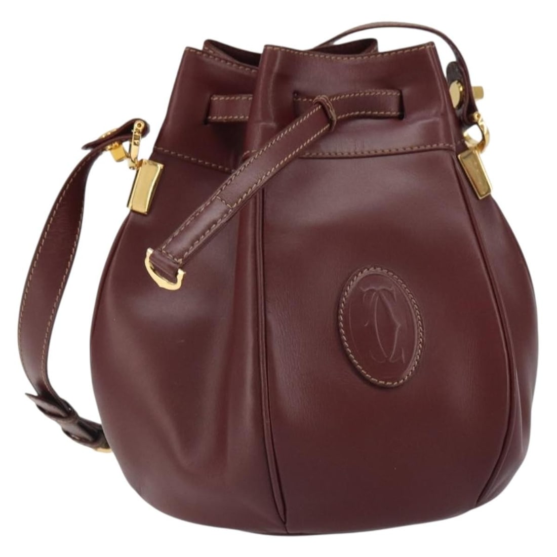 Cartier Must Line Bordeaux Leather Shoulder Bag with Gold Tone Accents: Cartier Must Line Bordeaux Leather Shoulder Bag with Gold Tone Accents This Cartier Must Line shoulder bag features a bordeaux leather exterior with gold accents. Designed for women, it offers a struc